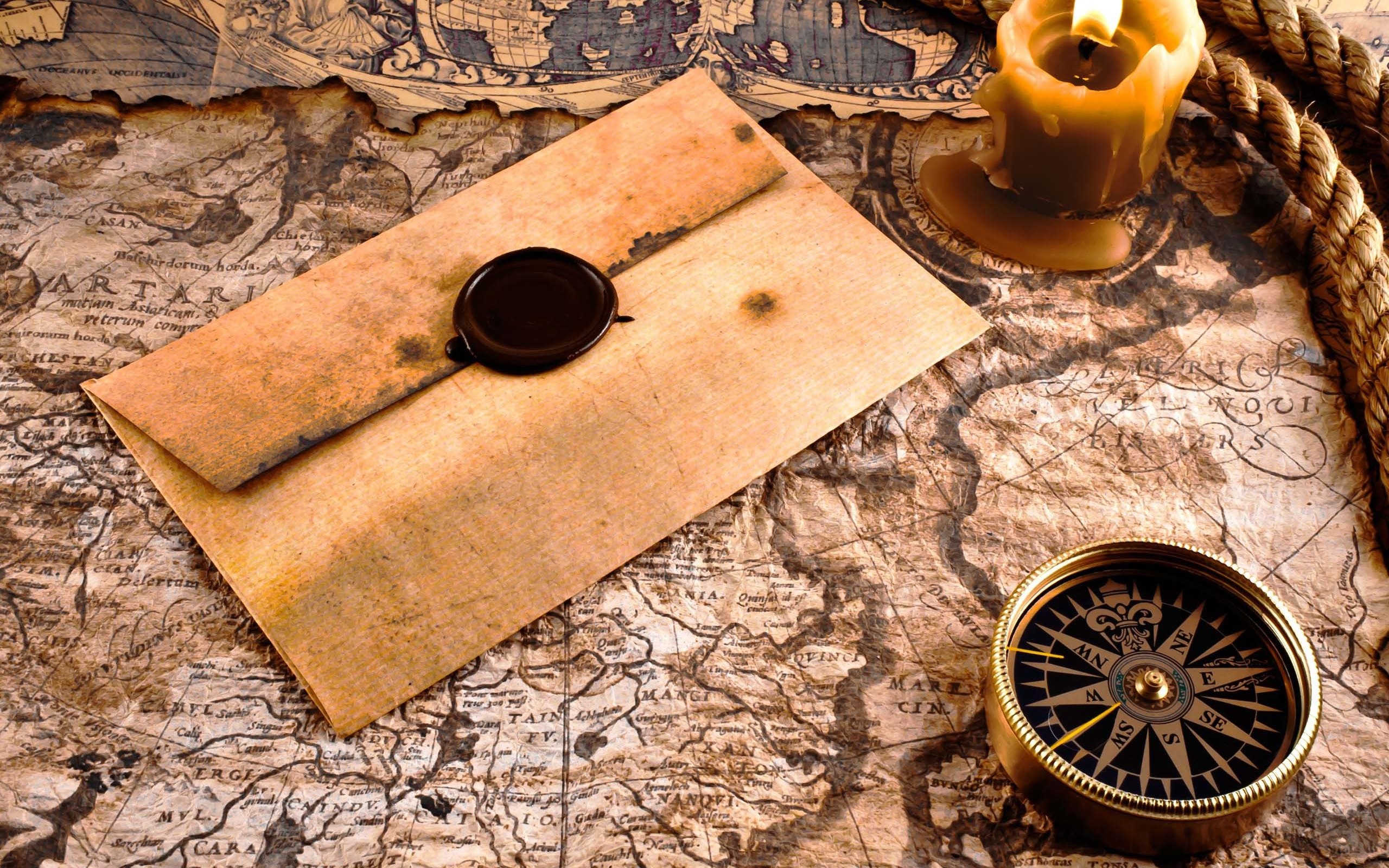 2560x1600 compass, envelope, and map image