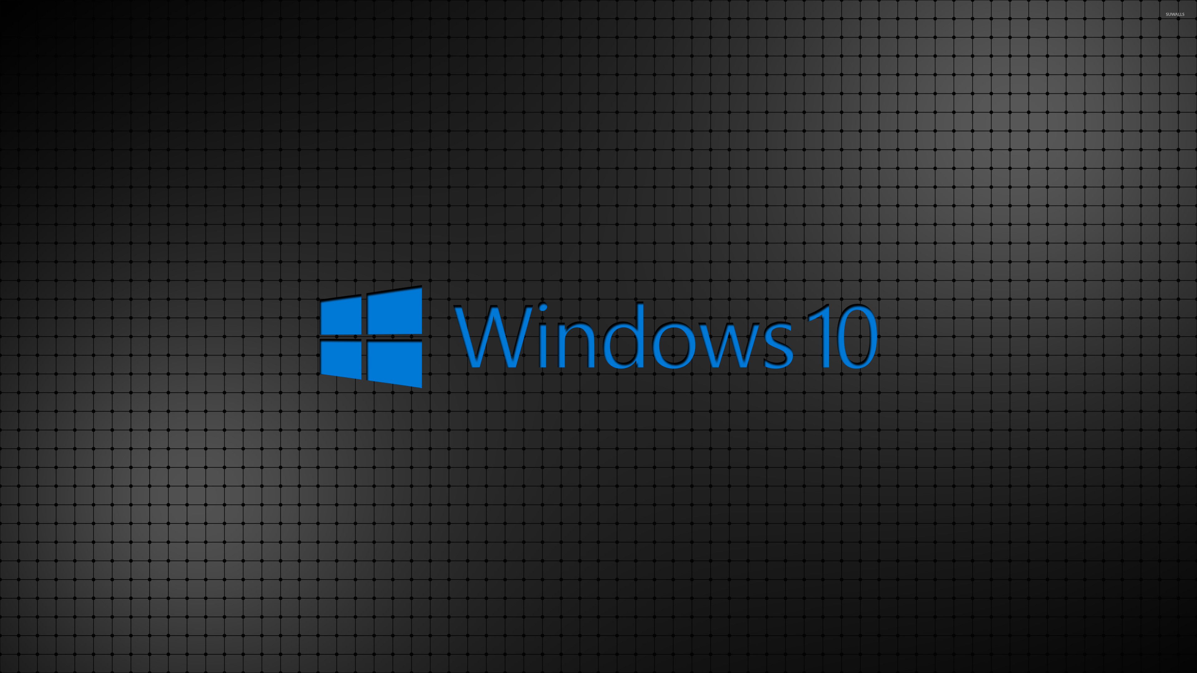3840x2160 Windows 10 blue text logo on a grid wallpaper