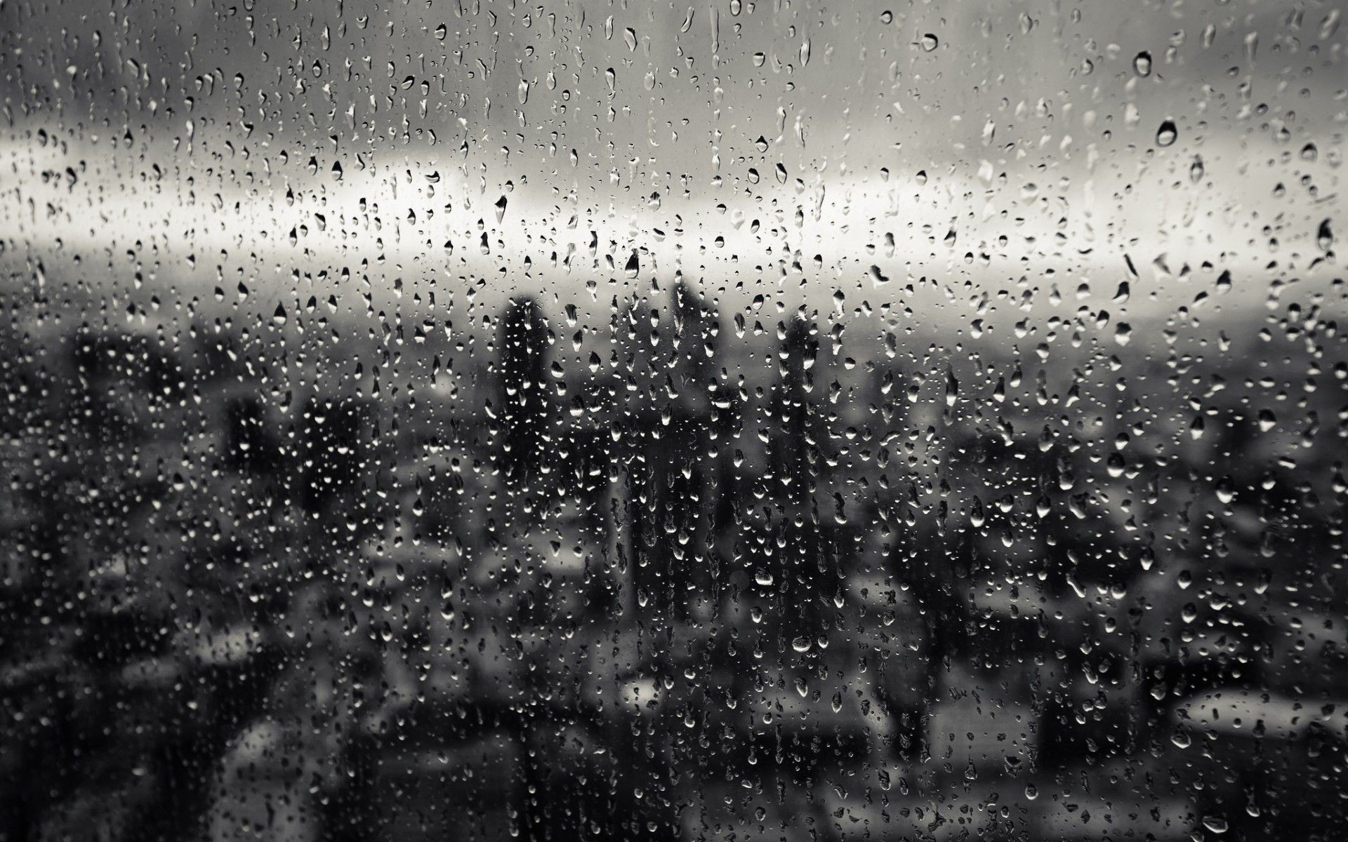 1920x1200  Drops glass rain window city - WallSummit