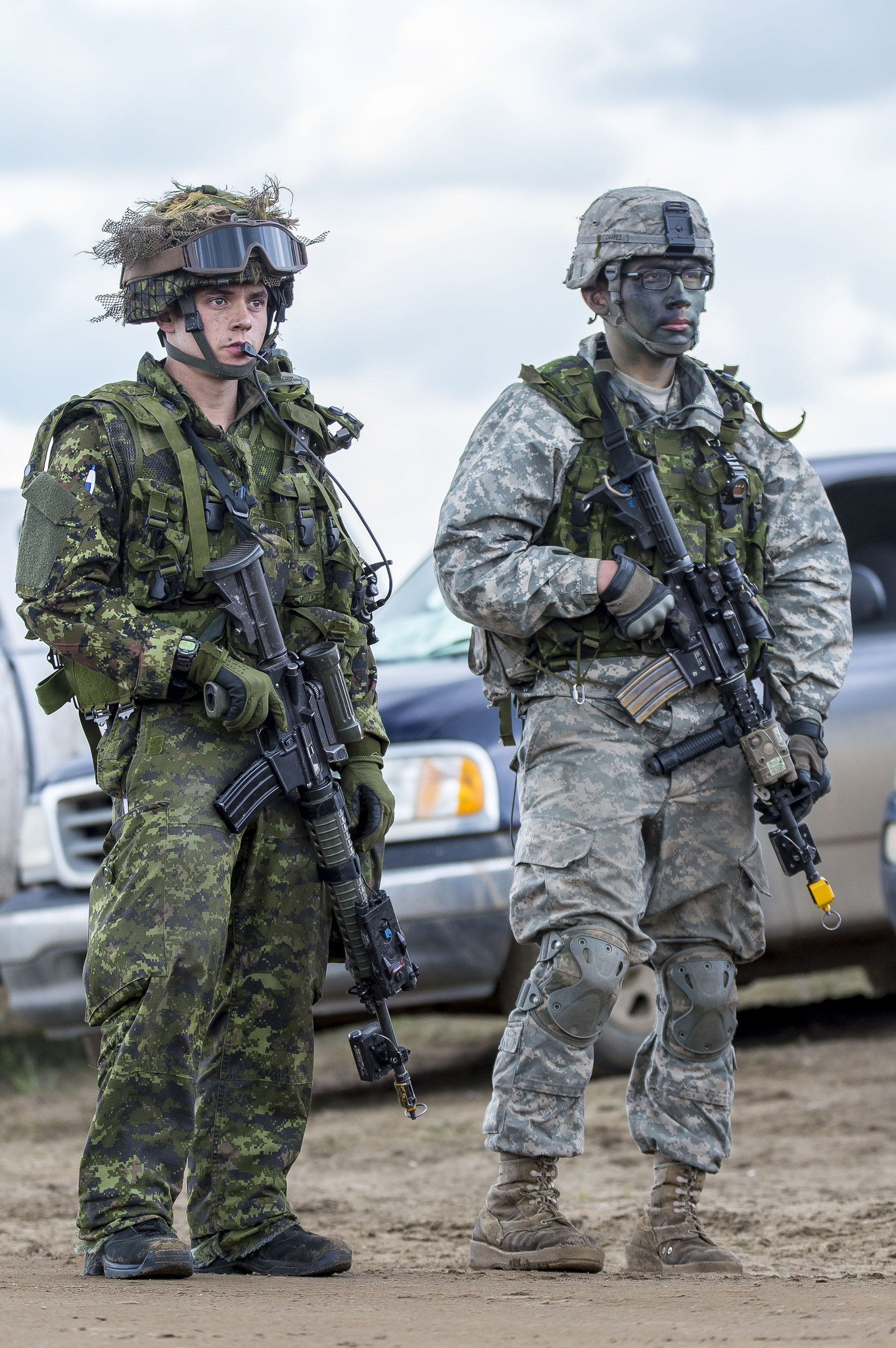 1363x2048 Members of the US and Canadian Army's await the arrival of the village  police chief at the combat simulation town of El Penon May 31 2016 x  wallpaper/ ...