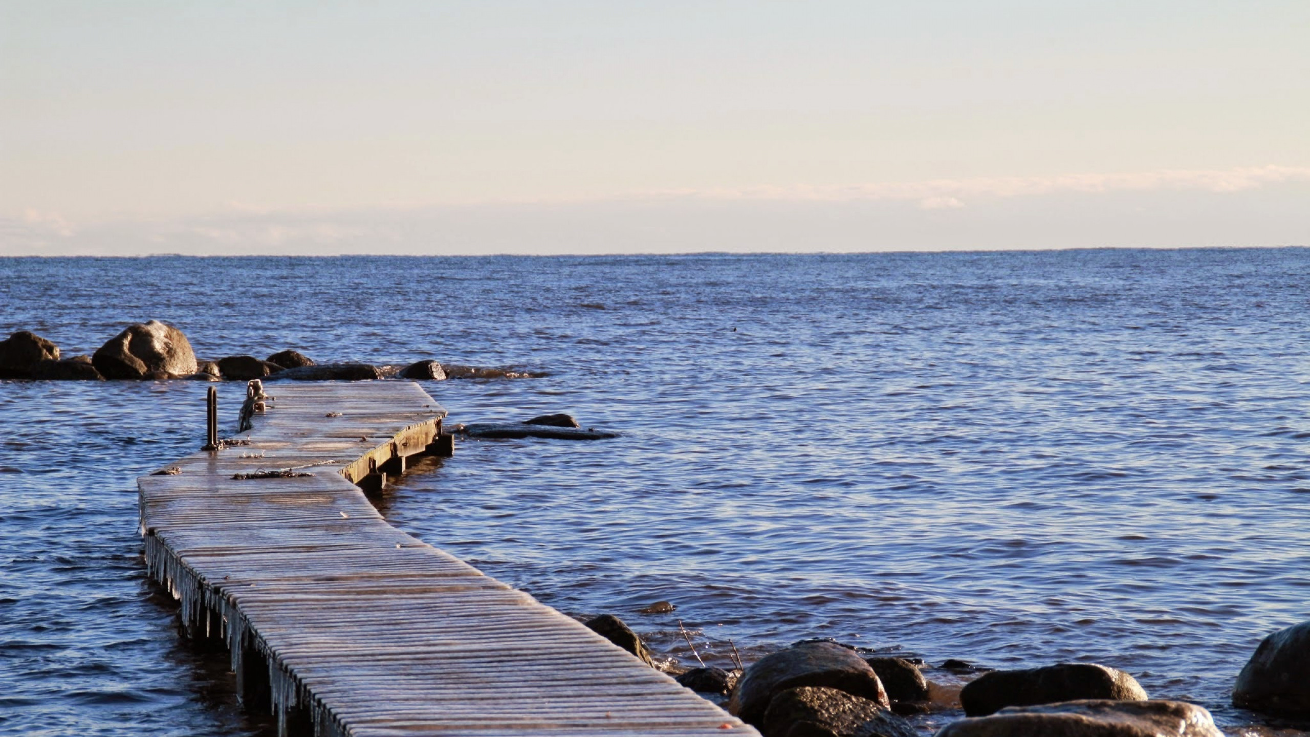 2560x1440  Wallpaper sweden, sea, beach, stones