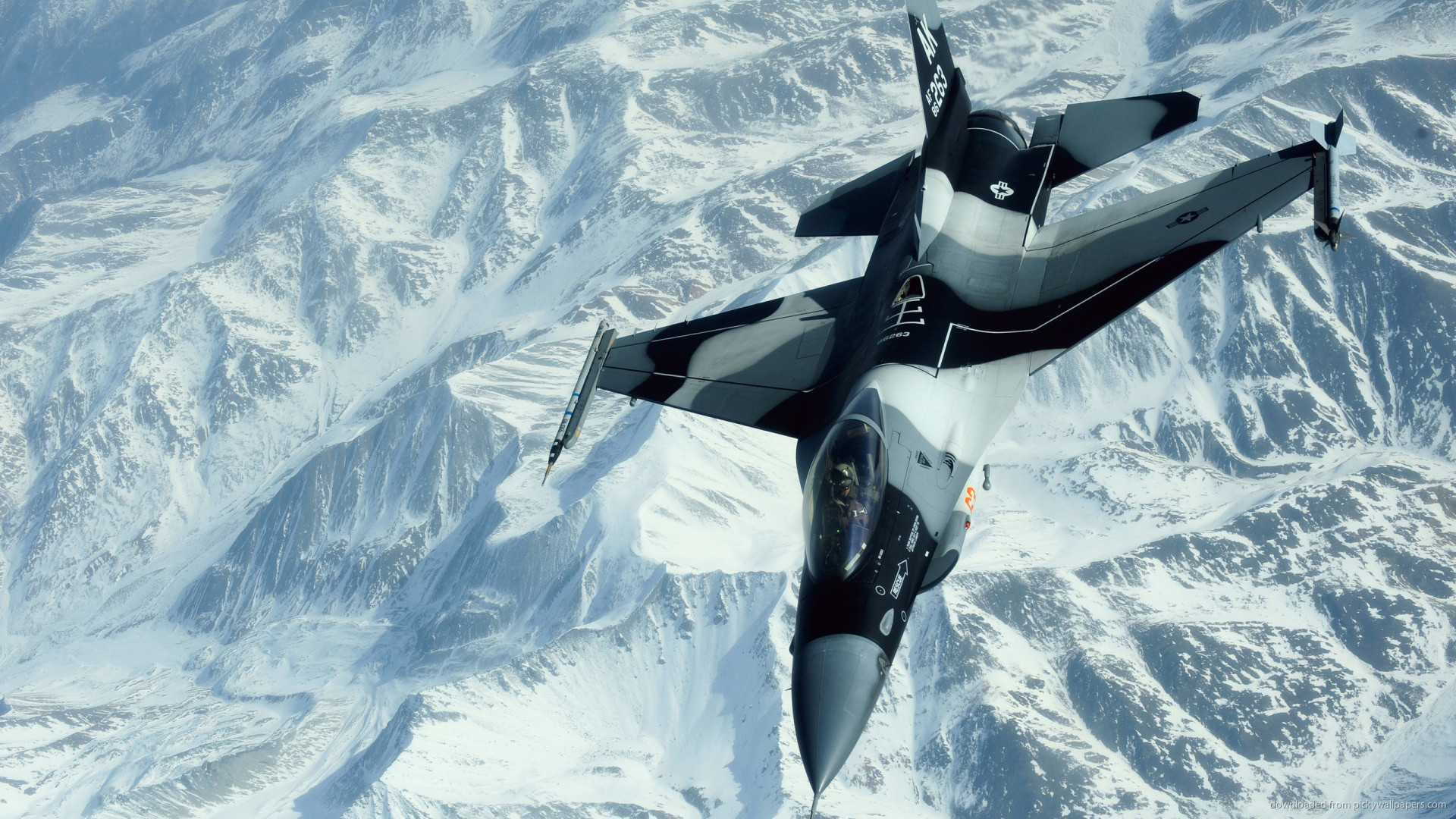 1920x1080 F16 over snowy mountains picture