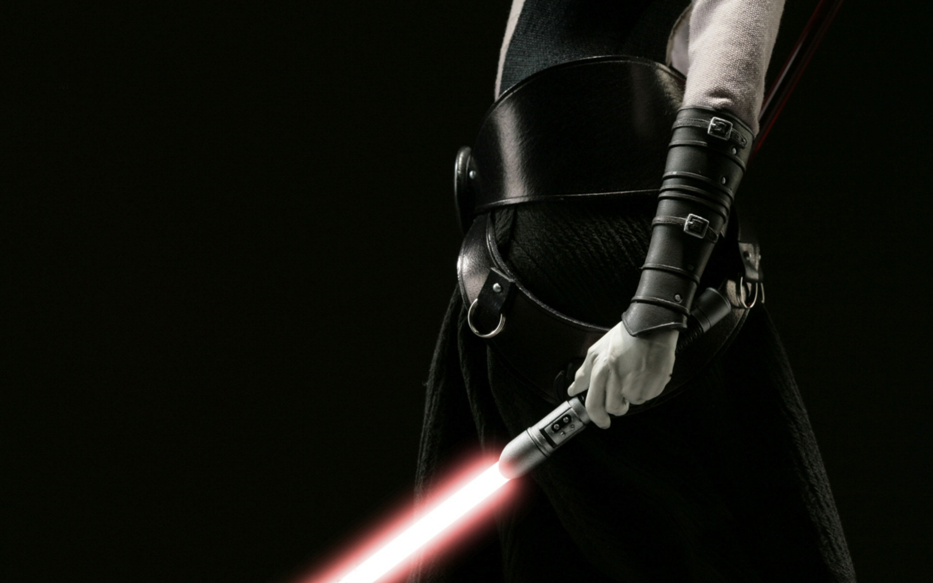 1920x1200 Sith Lord holding his light saber. Great mysterious shot.