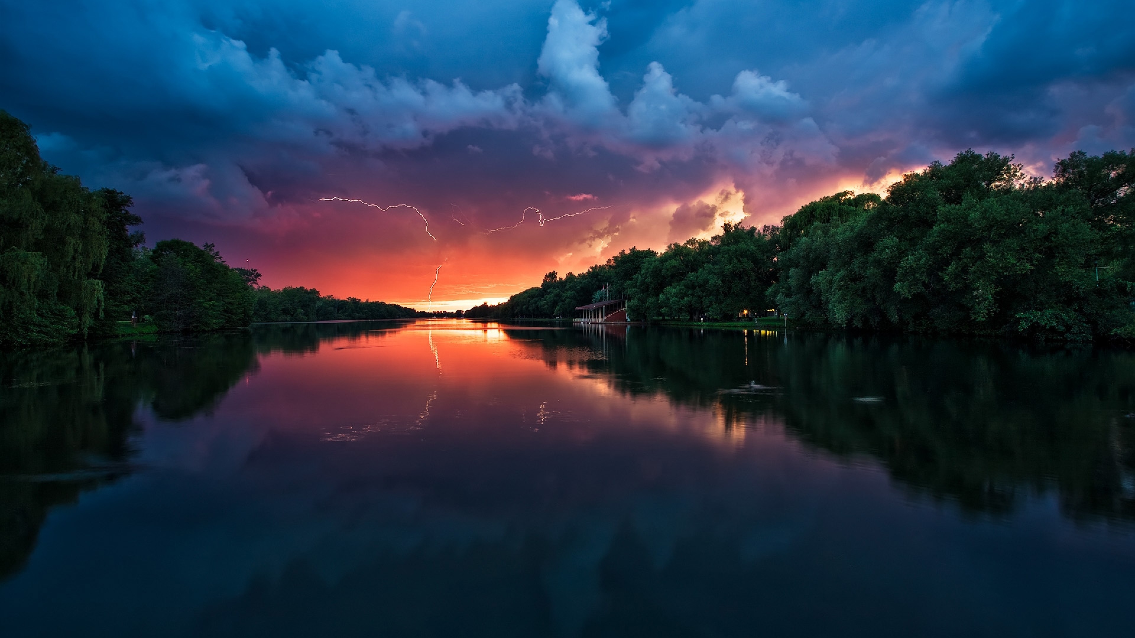 3840x2160 Preview wallpaper clouds, thunder-storm, river, reflection, lightning,  trees 