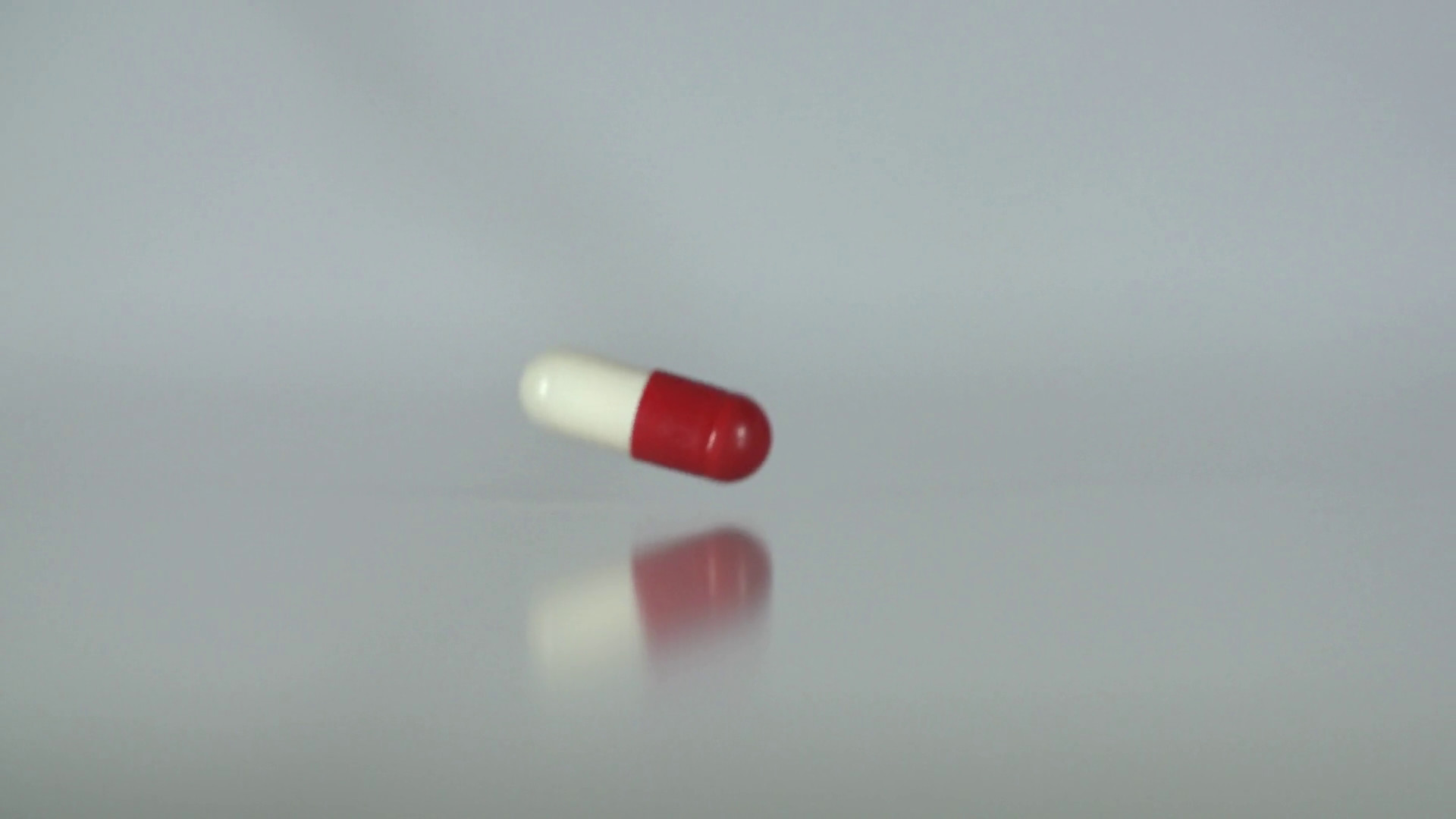1920x1080 Medicine, drugs, pills, capsules falling in slow motion on a neutral  background. Stock Video Footage - VideoBlocks