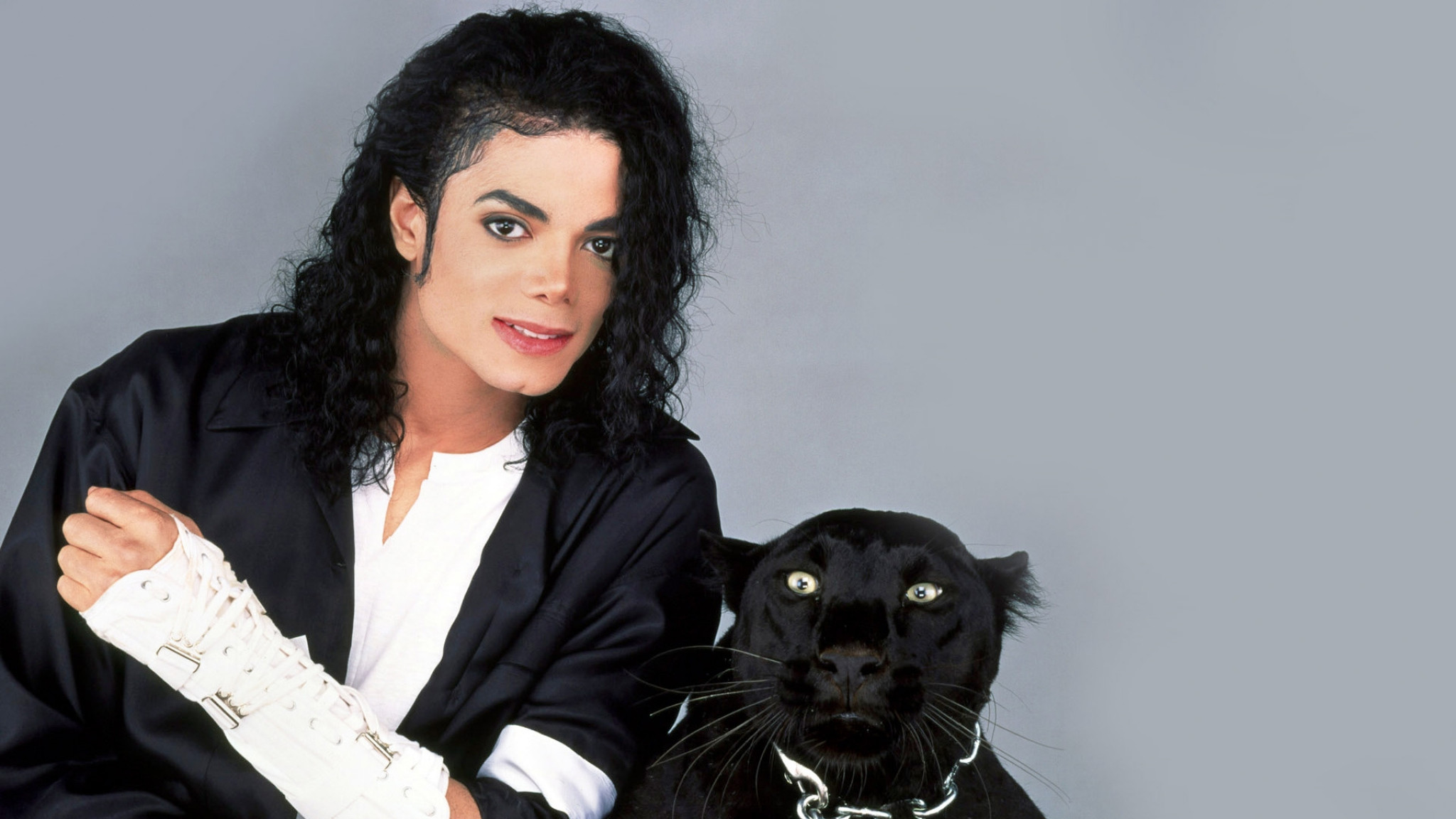 2048x1152 Preview wallpaper michael jackson, panther, brunette, costume, cat 