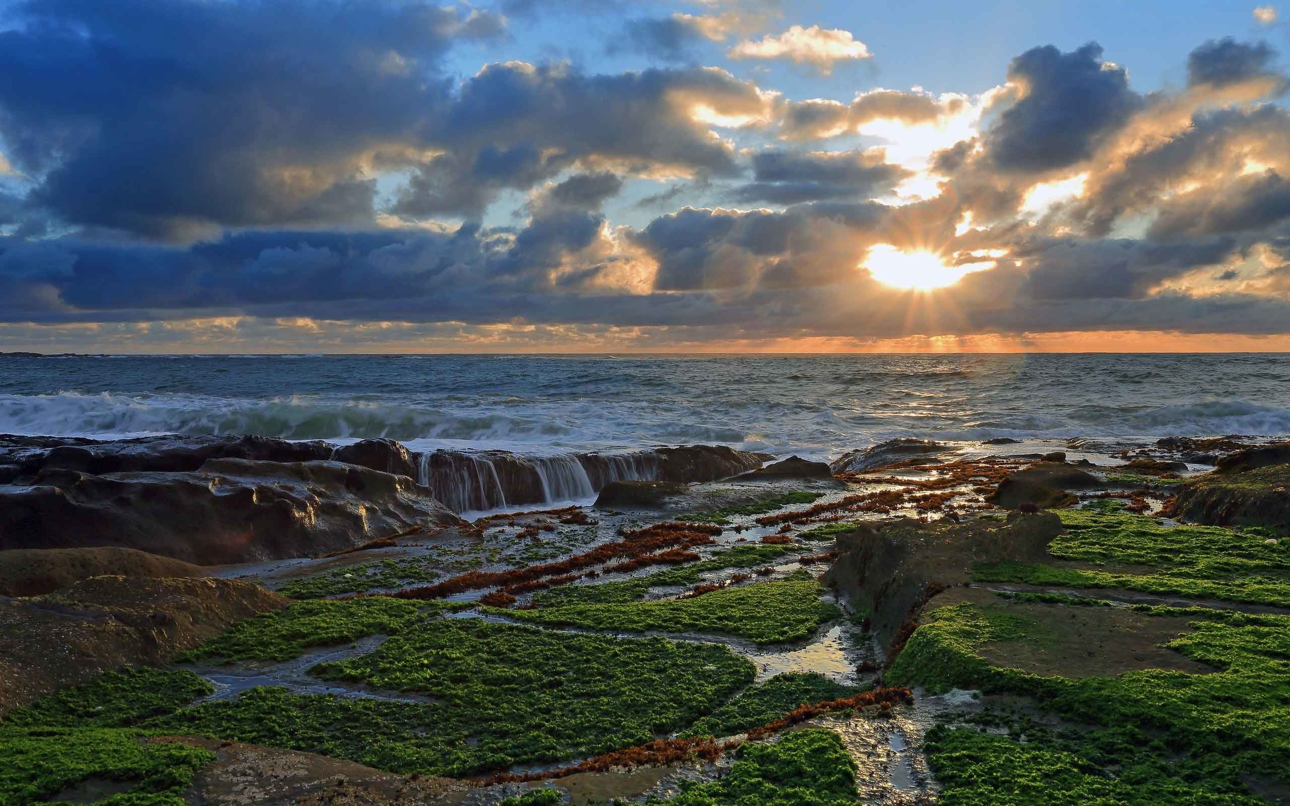2560x1600 Sunrise Sunset Coast Clouds Rocks Ocean Desktop Wallpaper Nature Scenes