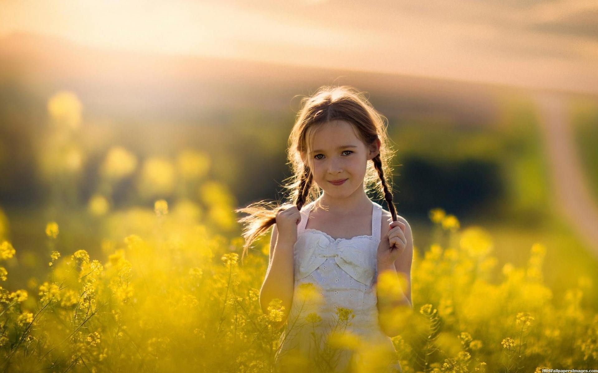 1920x1200 Cute Baby Girl Yellow Flowers Field Wallpapers & Pictures