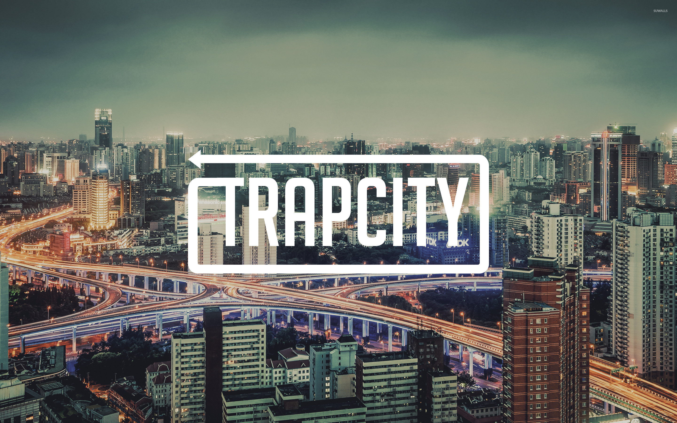 2880x1800 Trap City sign over the trail ights on the road wallpaper