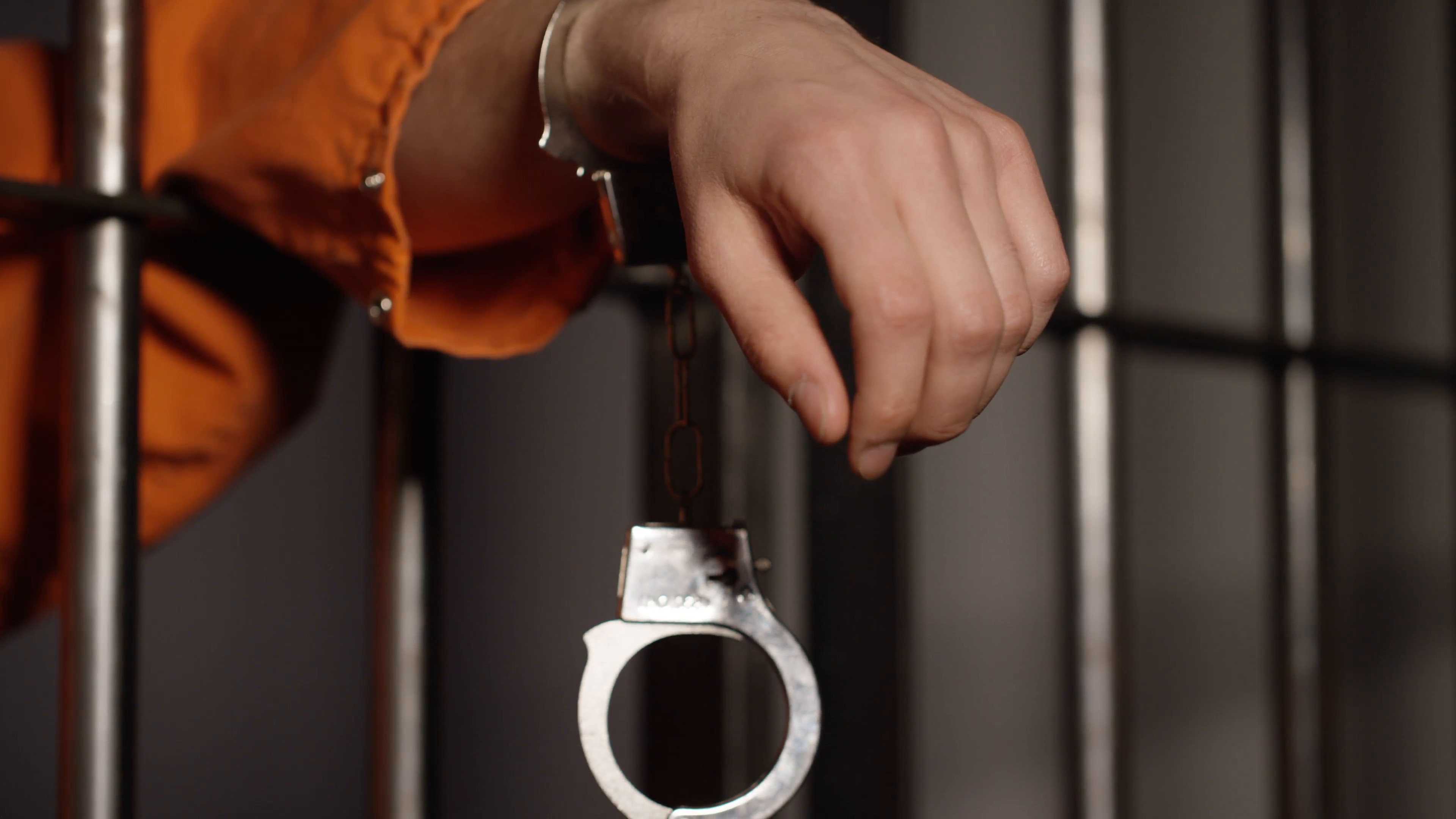 3840x2160 Subscription Library Prison cells in Jail - Handcuff dangling from man's  arm in cell