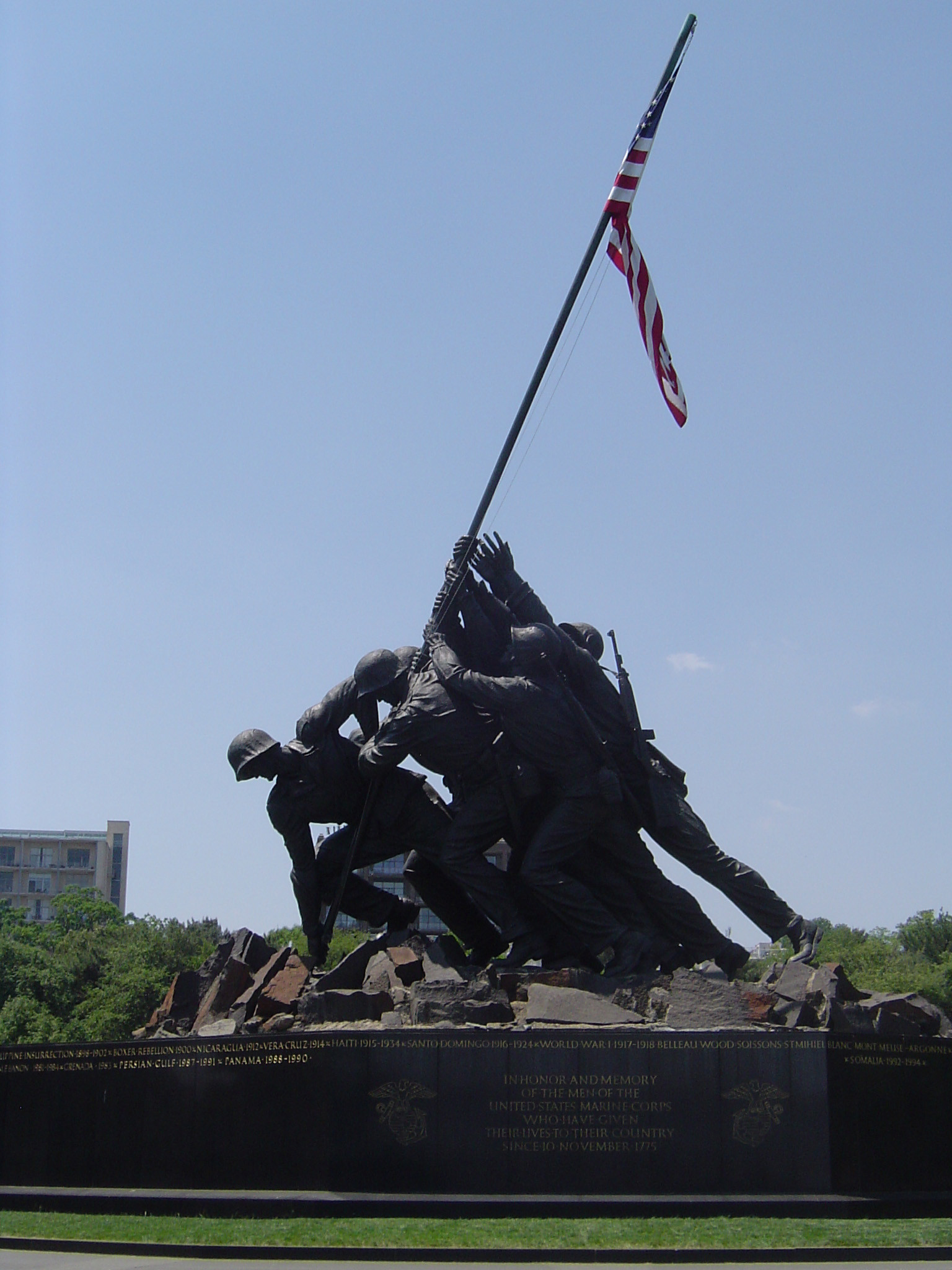 1536x2048 Old Vintage Marine Corps War Memorial Statue Holding American Flag.  Isolated on Light Blue Gray