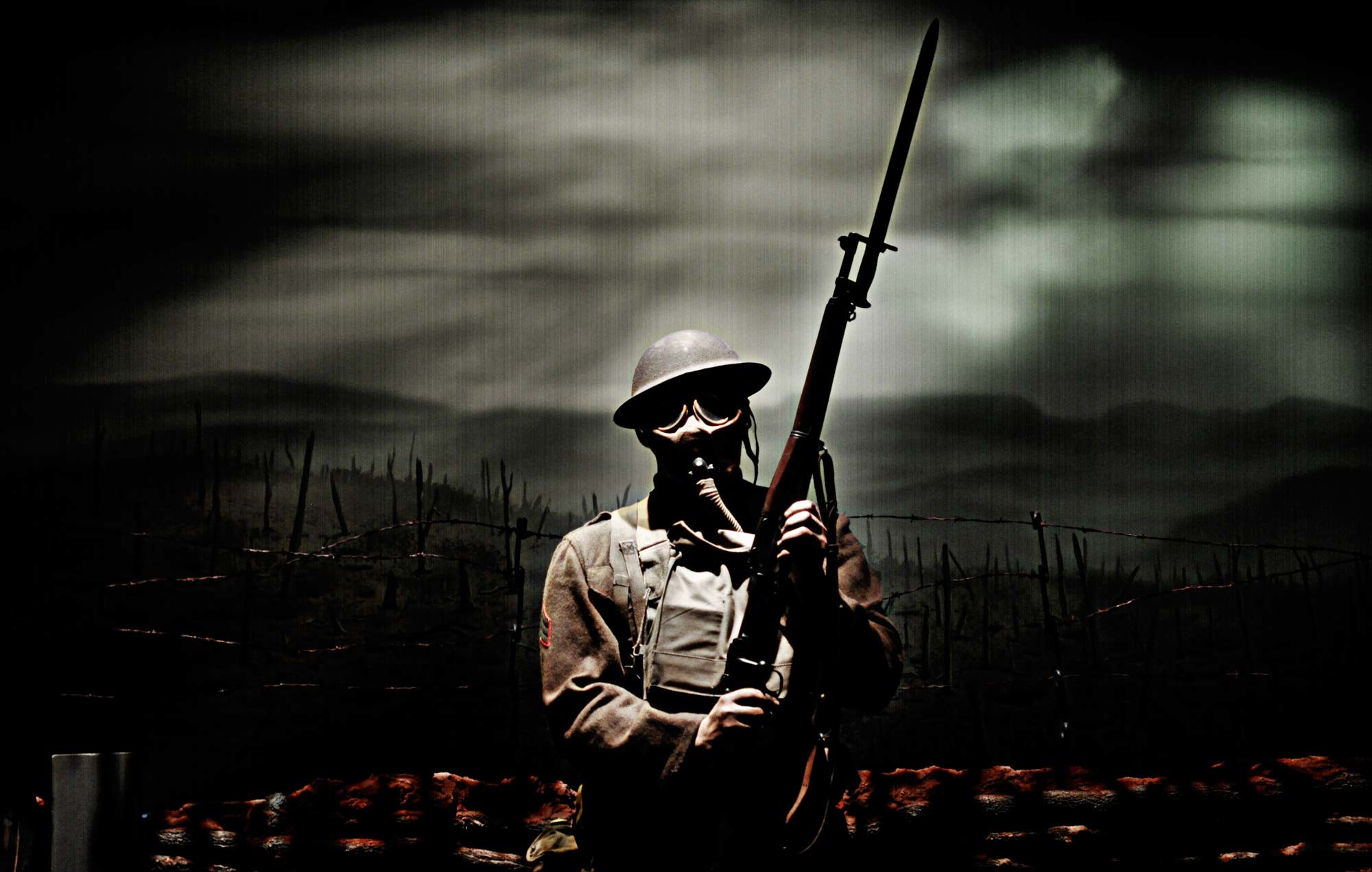 2000x1271 Soldier Rifle military weapons guns gas mask dark wallpaper background
