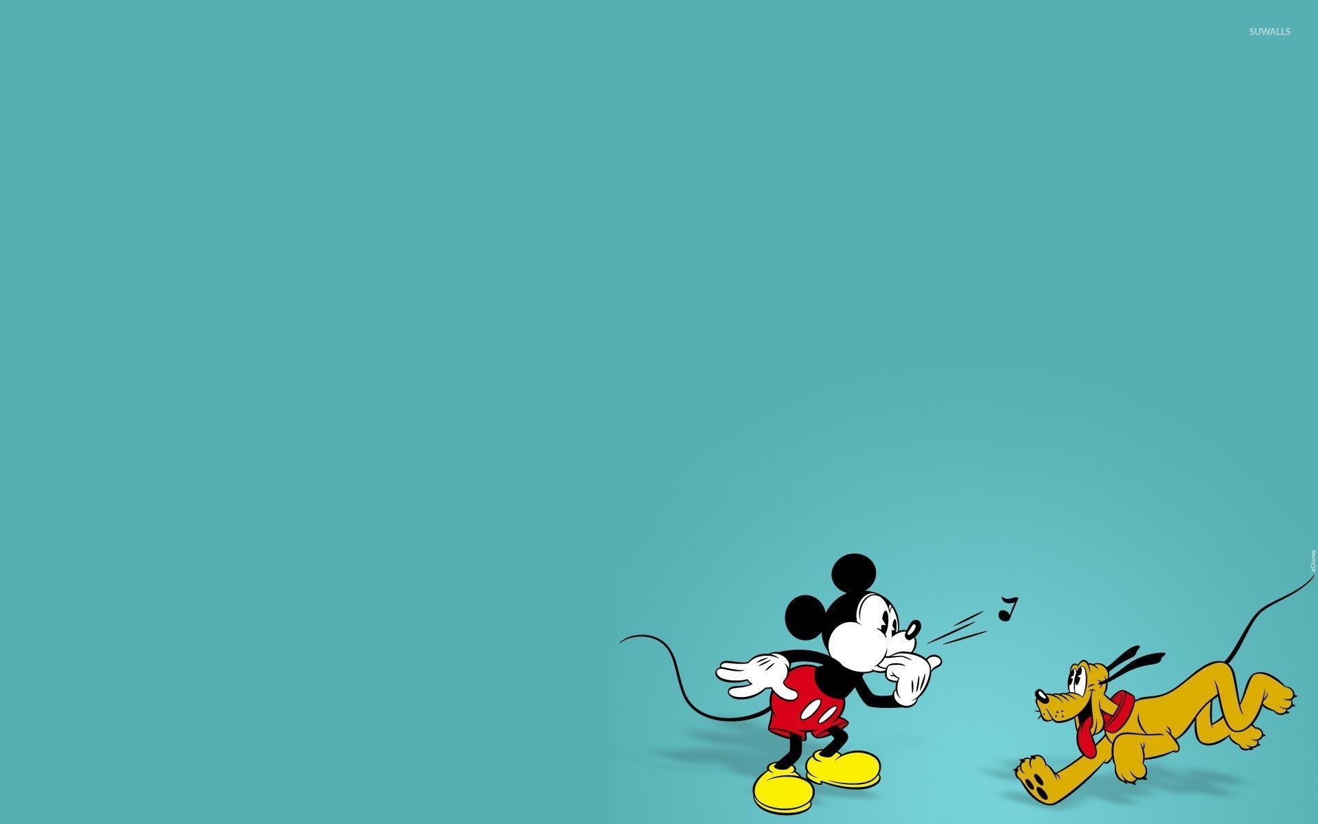 1920x1200 Mickey playing with Pluto wallpaper
