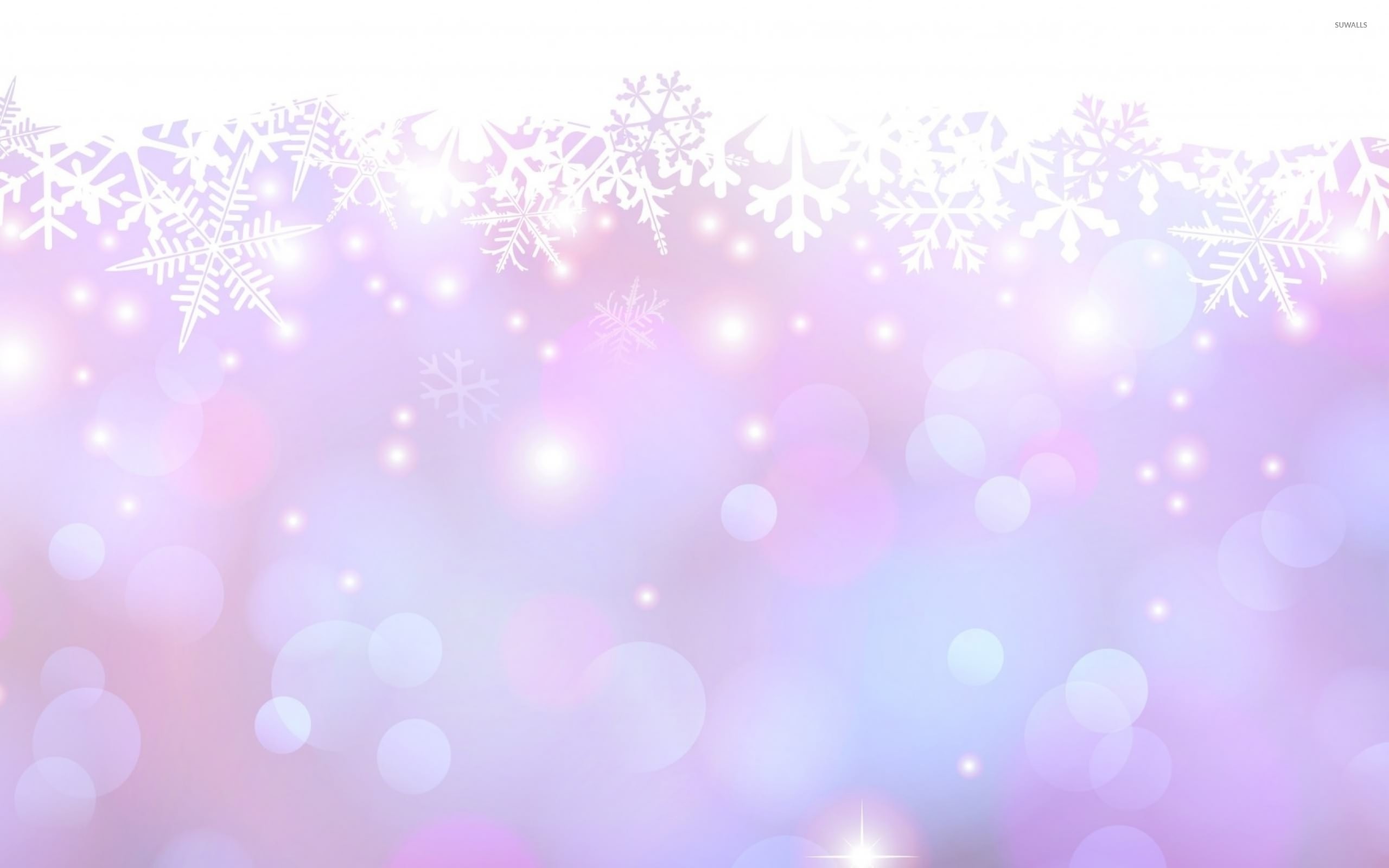 2560x1600 Glowing circle falling from the snowflakes wallpaper
