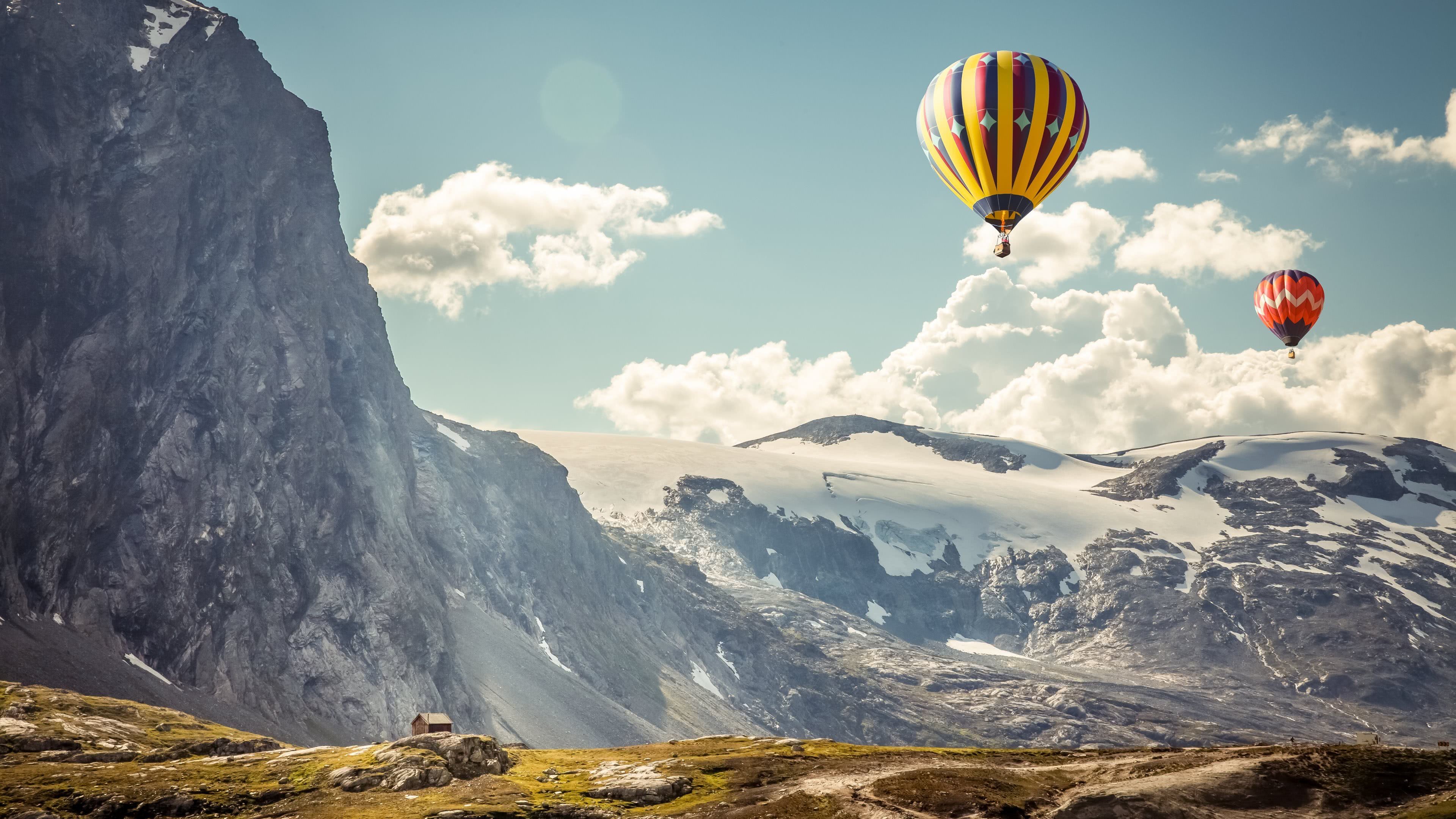 3840x2160 colorful hot air baloons with mountains uhd 4k wallpaper
