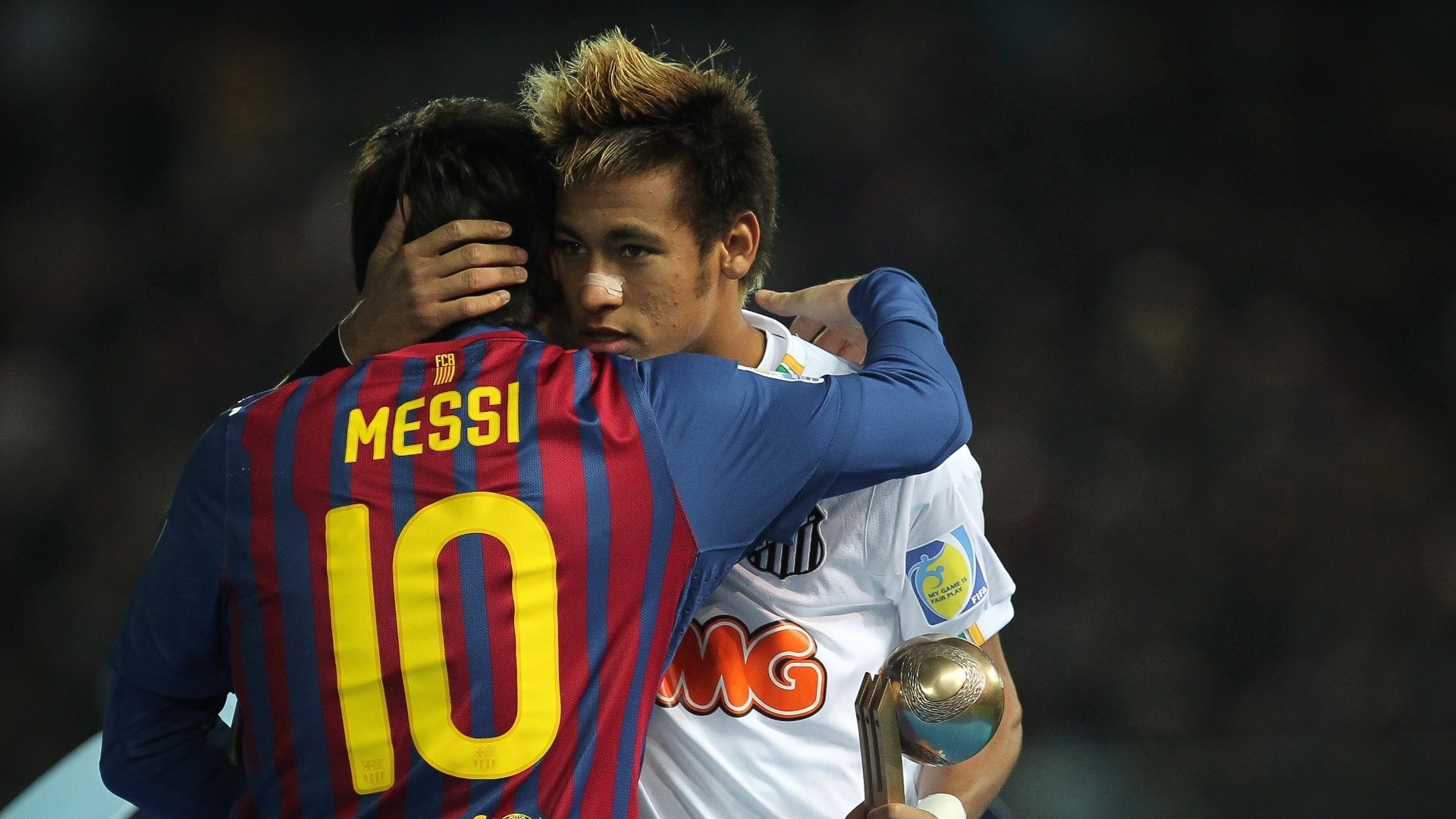 1920x1080 Neymar and Lionel Messi hugging each other