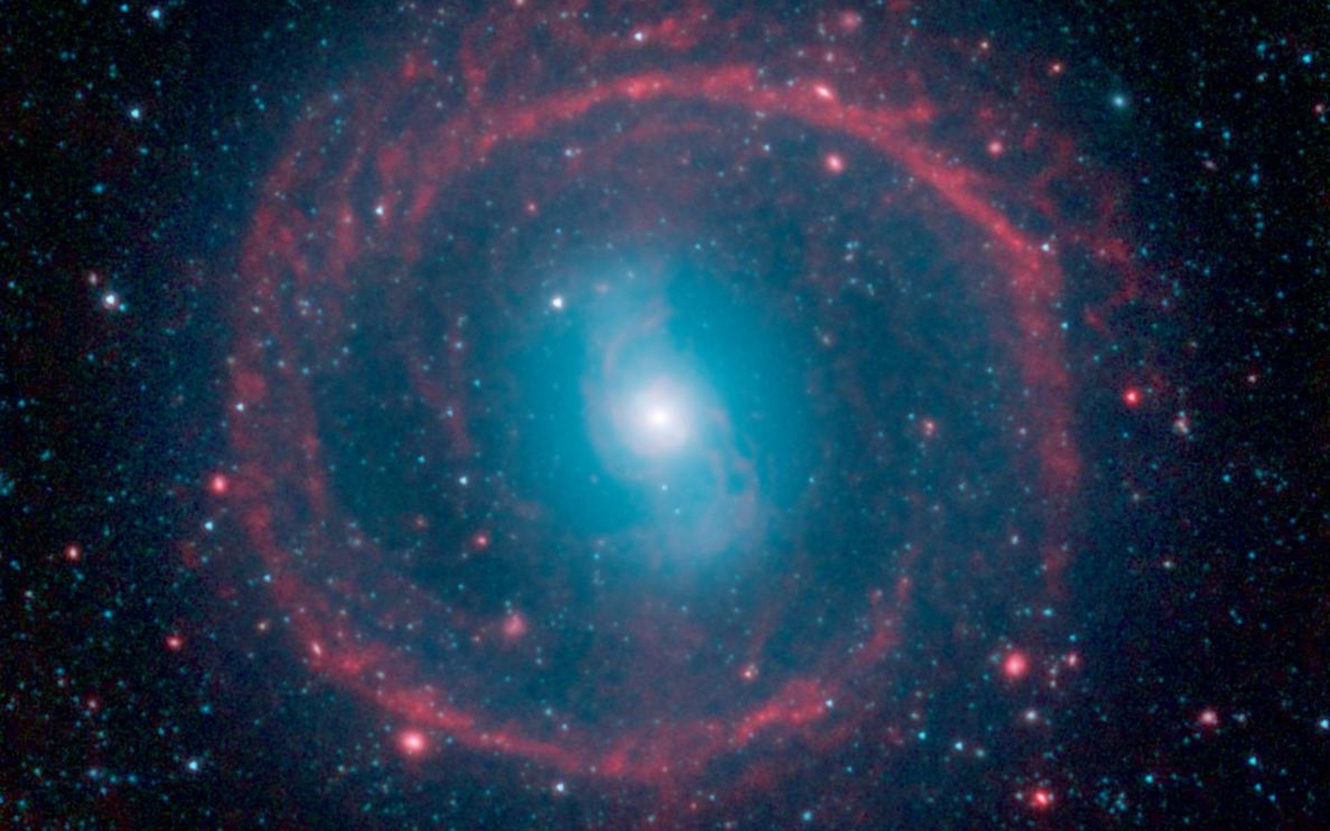 1920x1200 This image from NASA's Spitzer Space Telescope shows where the action is  taking place in galaxy