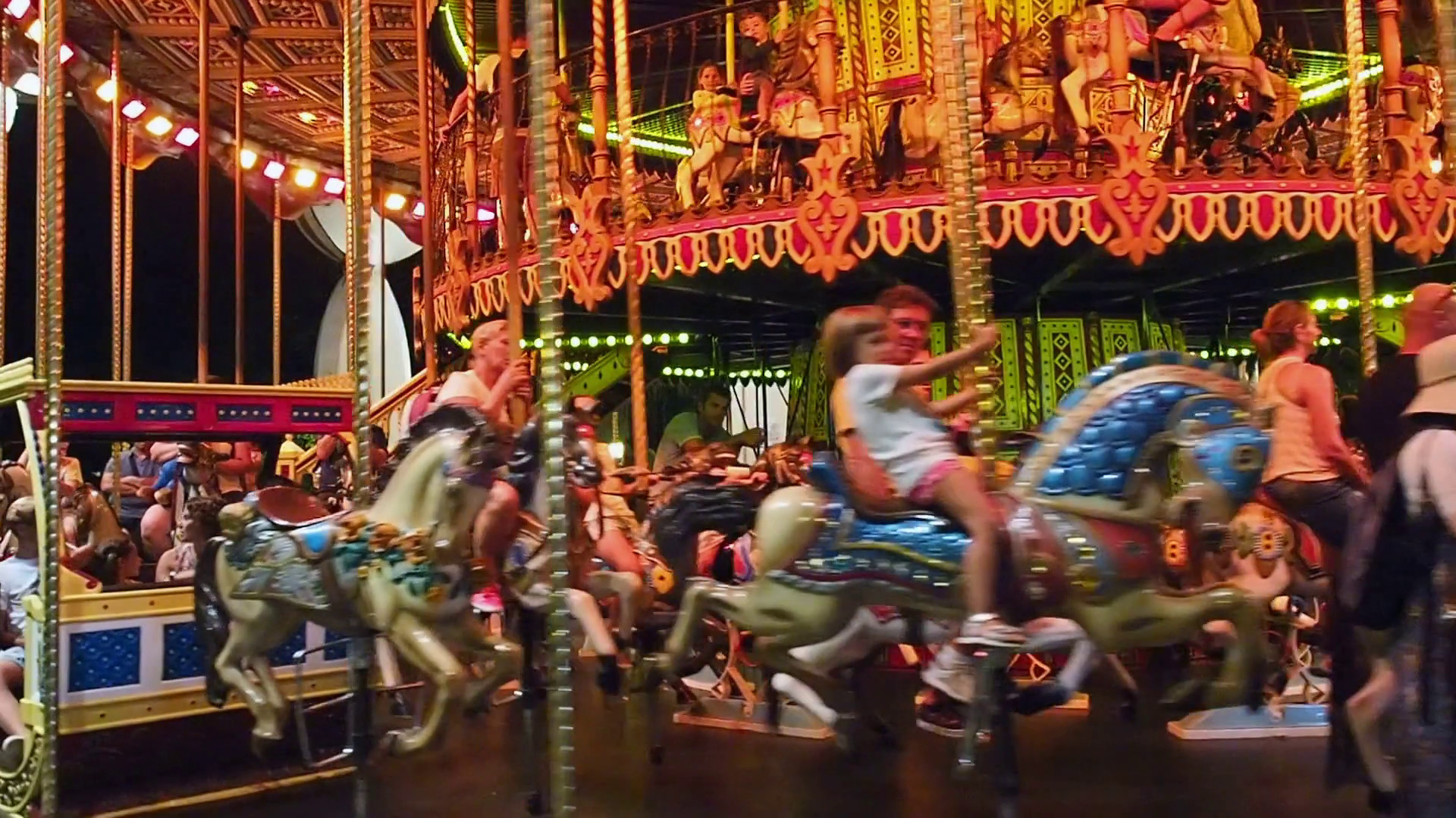 1920x1080 People having fun riding merry go round carousel at night Stock Video  Footage - VideoBlocks