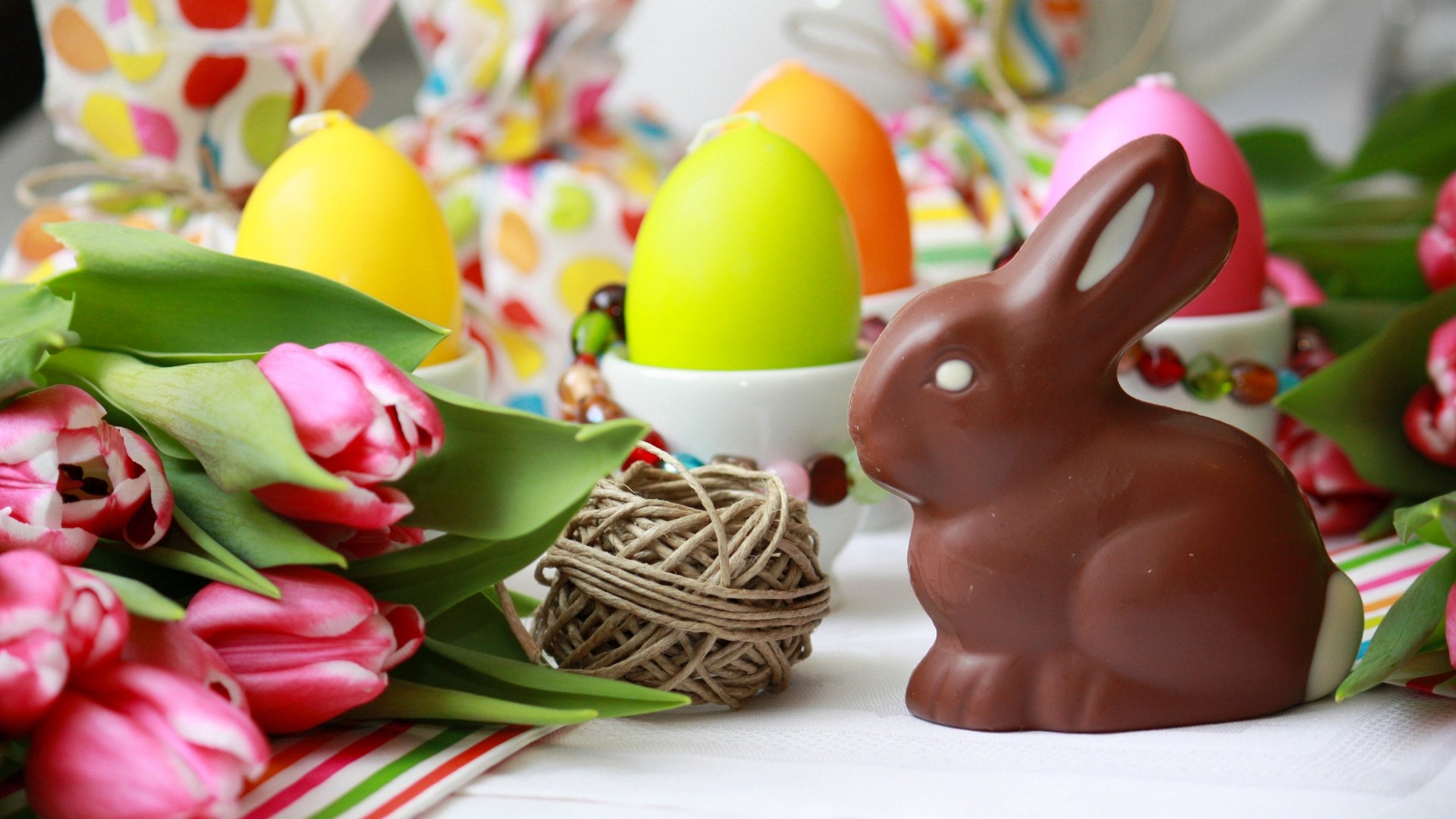 1920x1080  Wallpaper easter bunny, chocolate, tulips, eggs, table