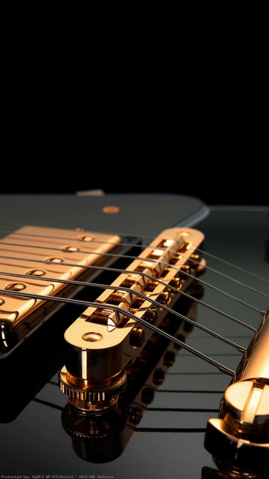 1080x1920 guitar-strings-black-gold-image-1080%C3%971920-