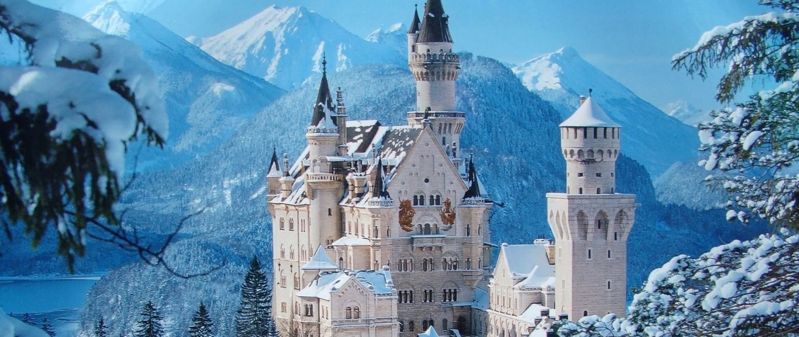 2560x1080 Preview wallpaper castle, snow, mountains, winter, pretty 