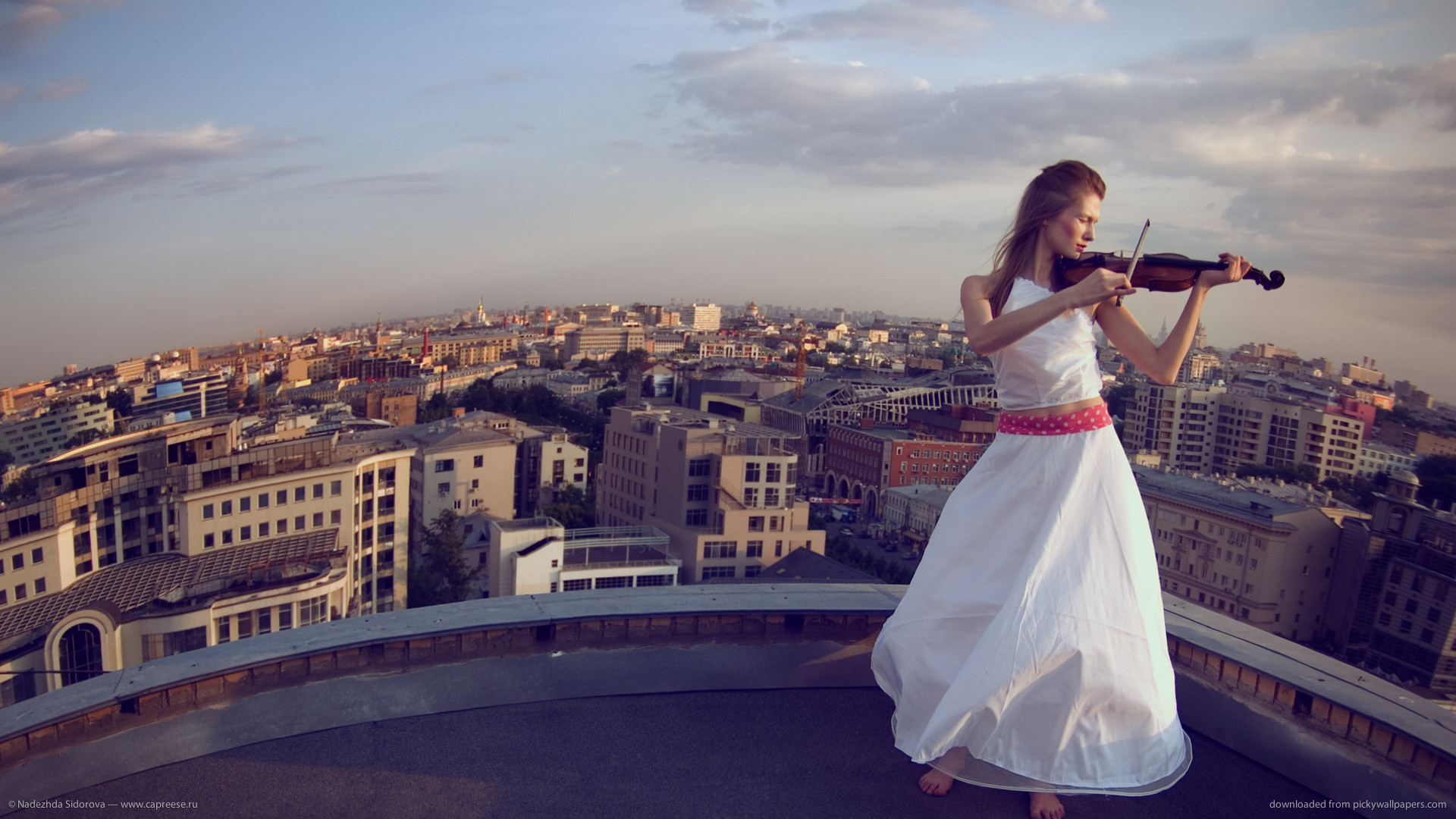 1920x1080  Playing violin on a roof wallpaper