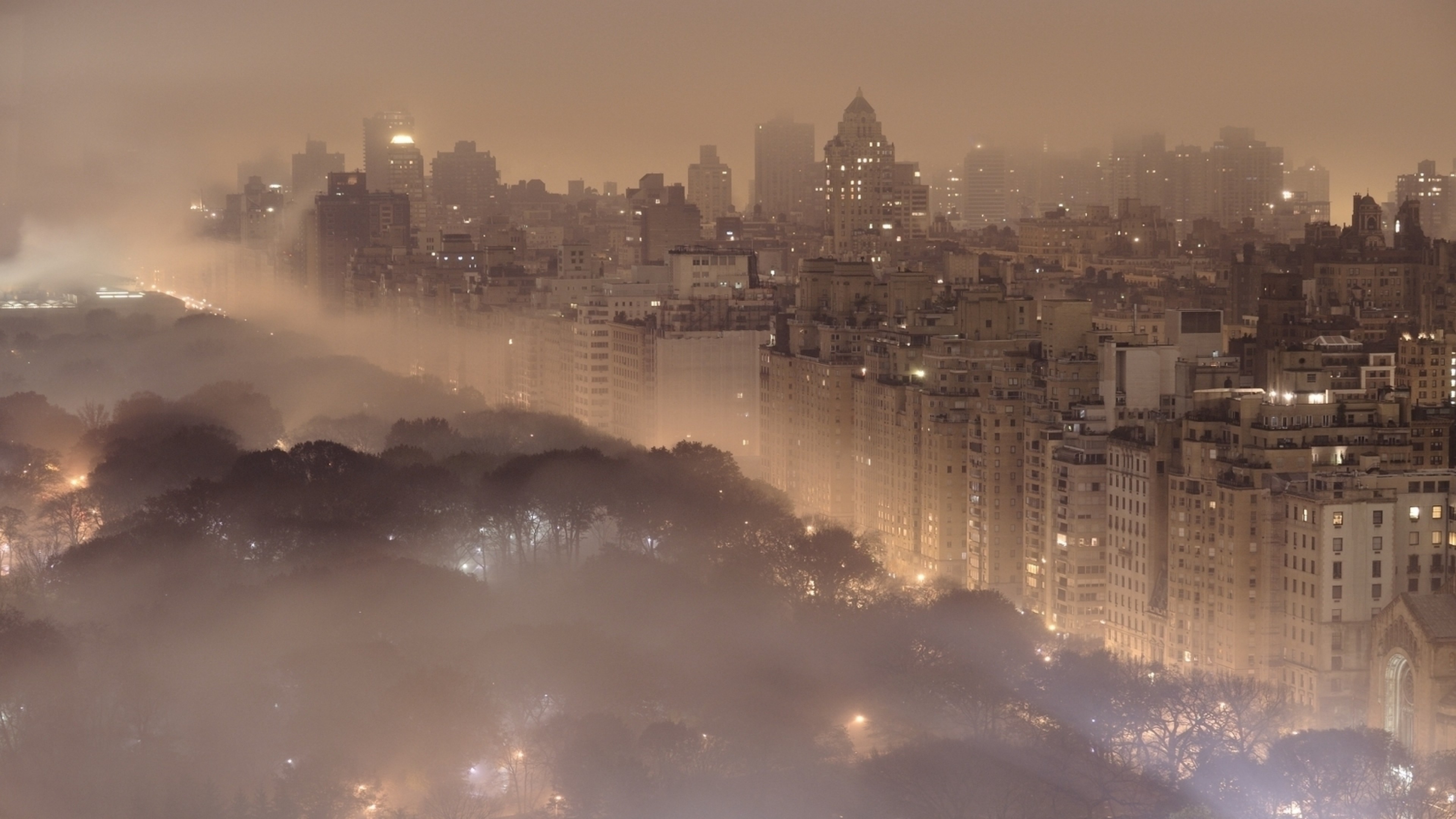 3840x2160 Preview wallpaper panorama, city, skyscrapers, buildings, windows, lights,  fog,