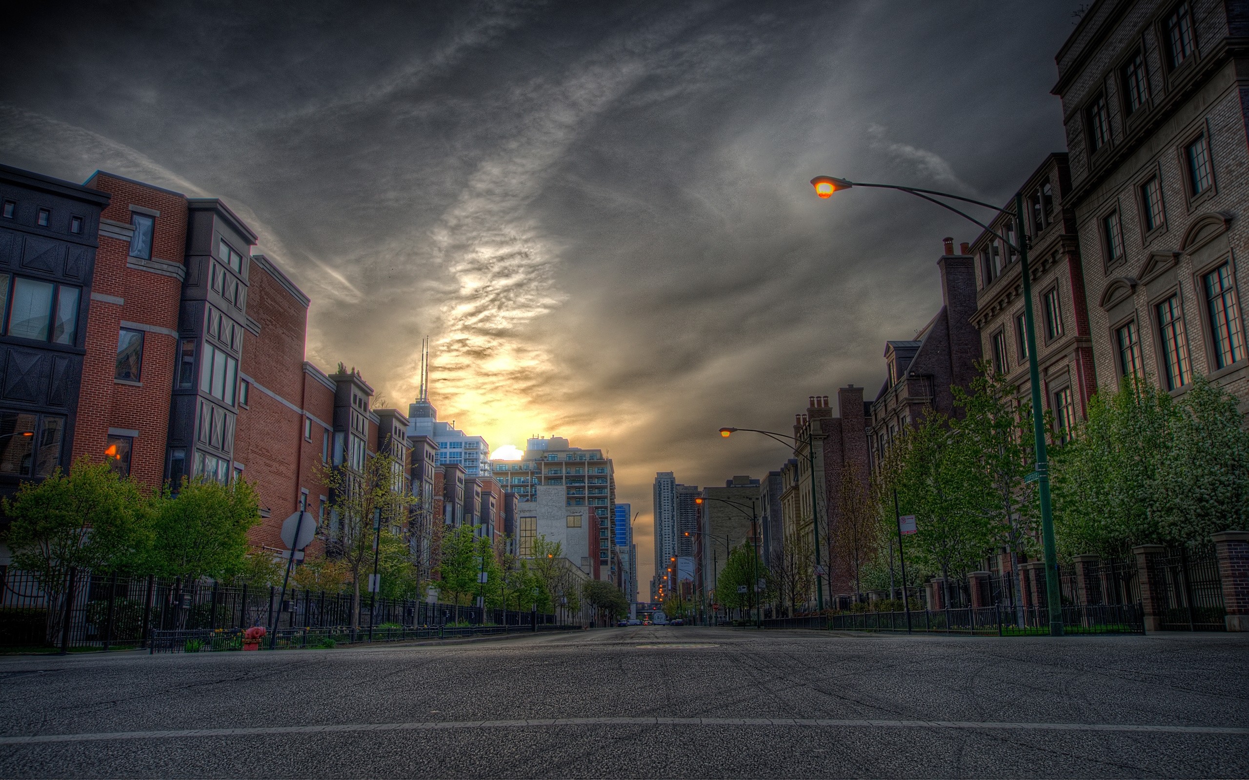2560x1600 Road with a buildings and park background Photo | Free Download ...