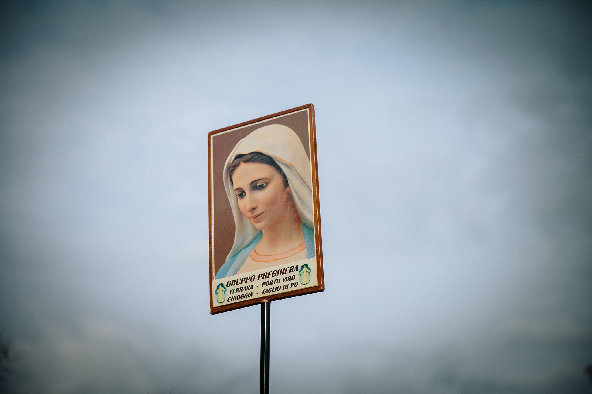 2048x1365 Picture of a sign showing an image of the Virgin Mary