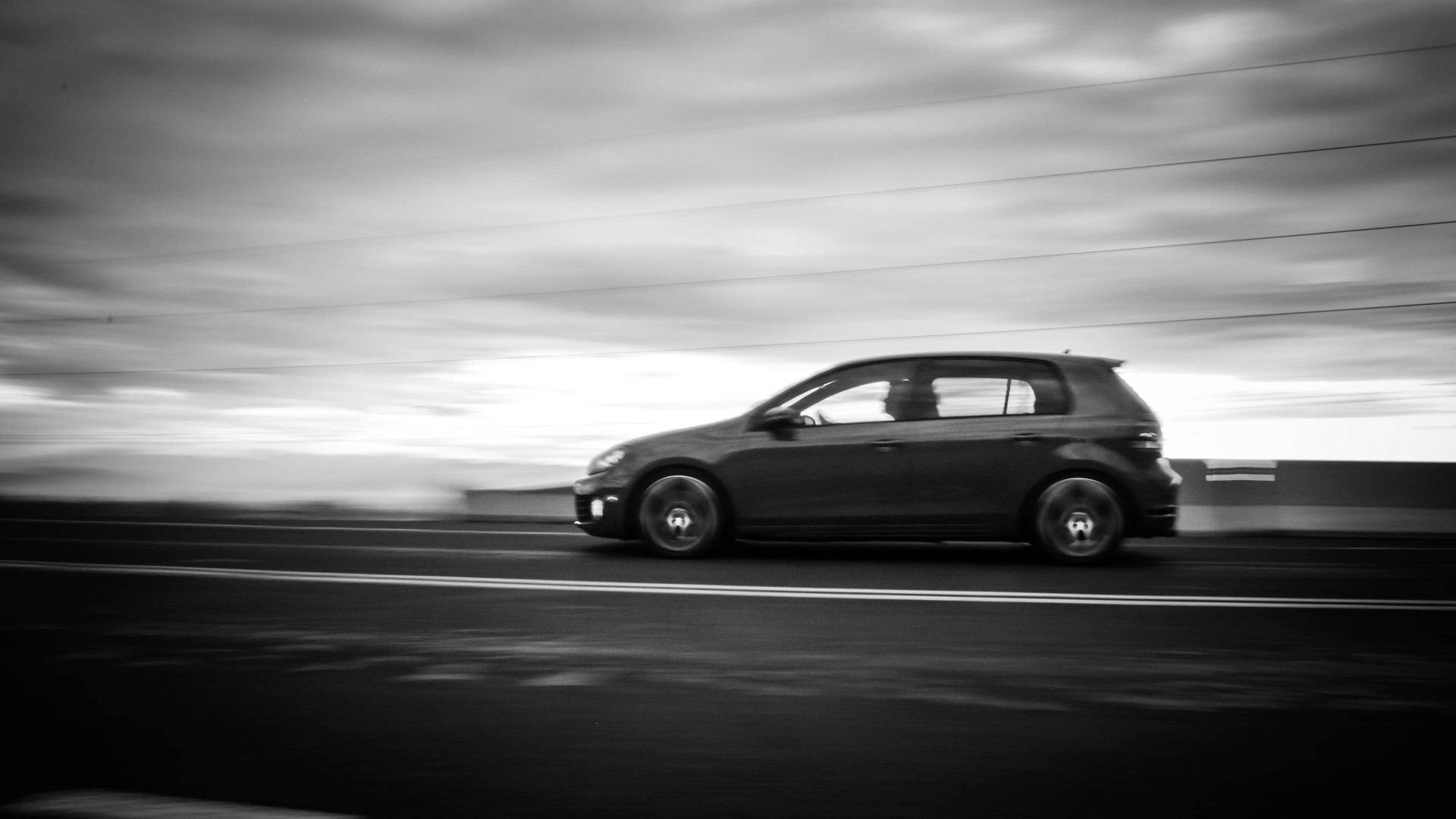 1920x1080 Some more hi-res wallpaper goodness. Rolling BW shot of a MKVI GTI.