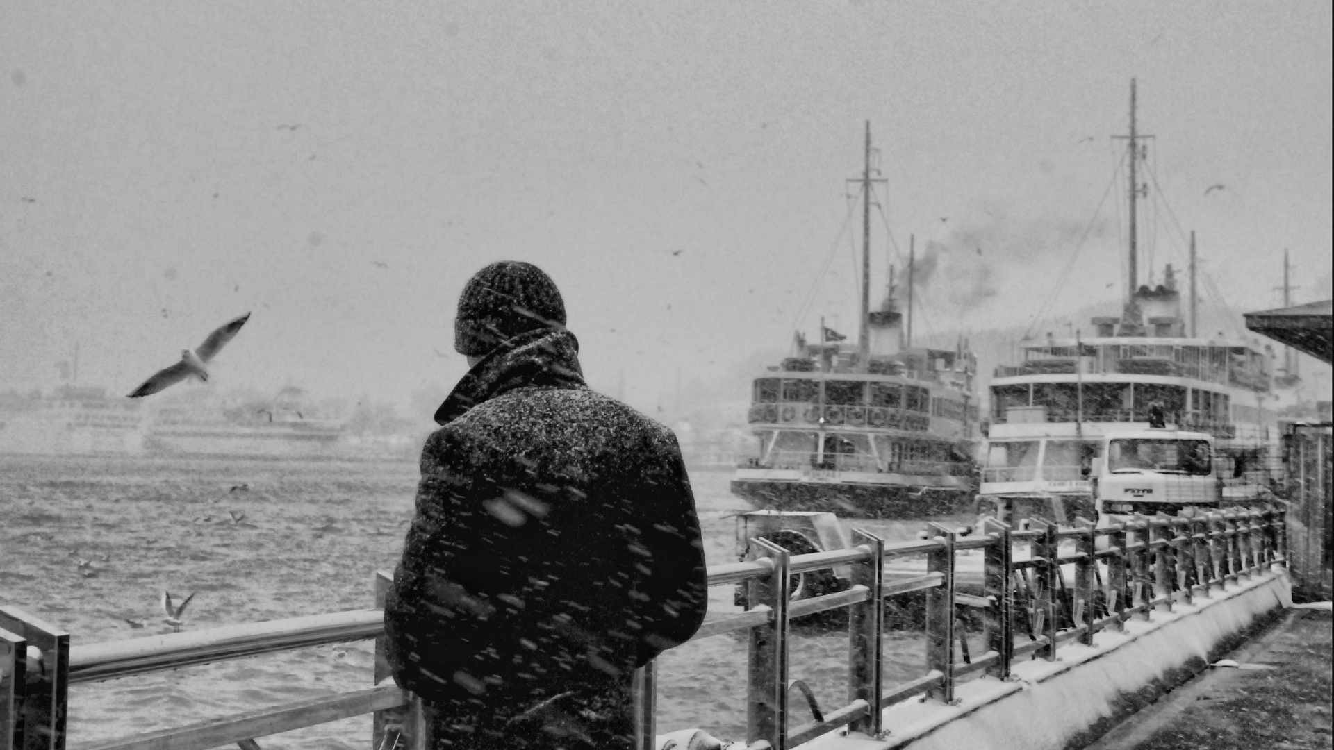 1920x1080 alone boy in snowfall (Full HD)