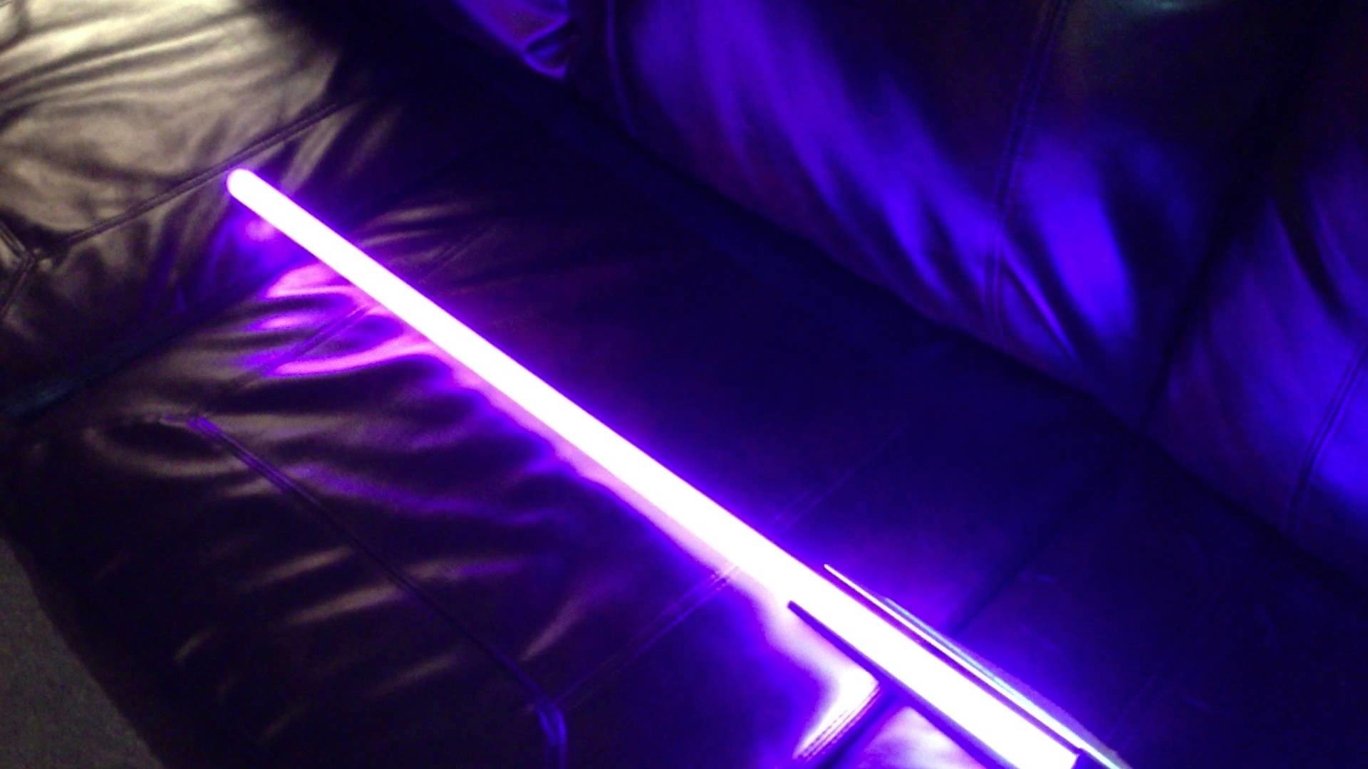 Purple Lightsaber Wallpaper.