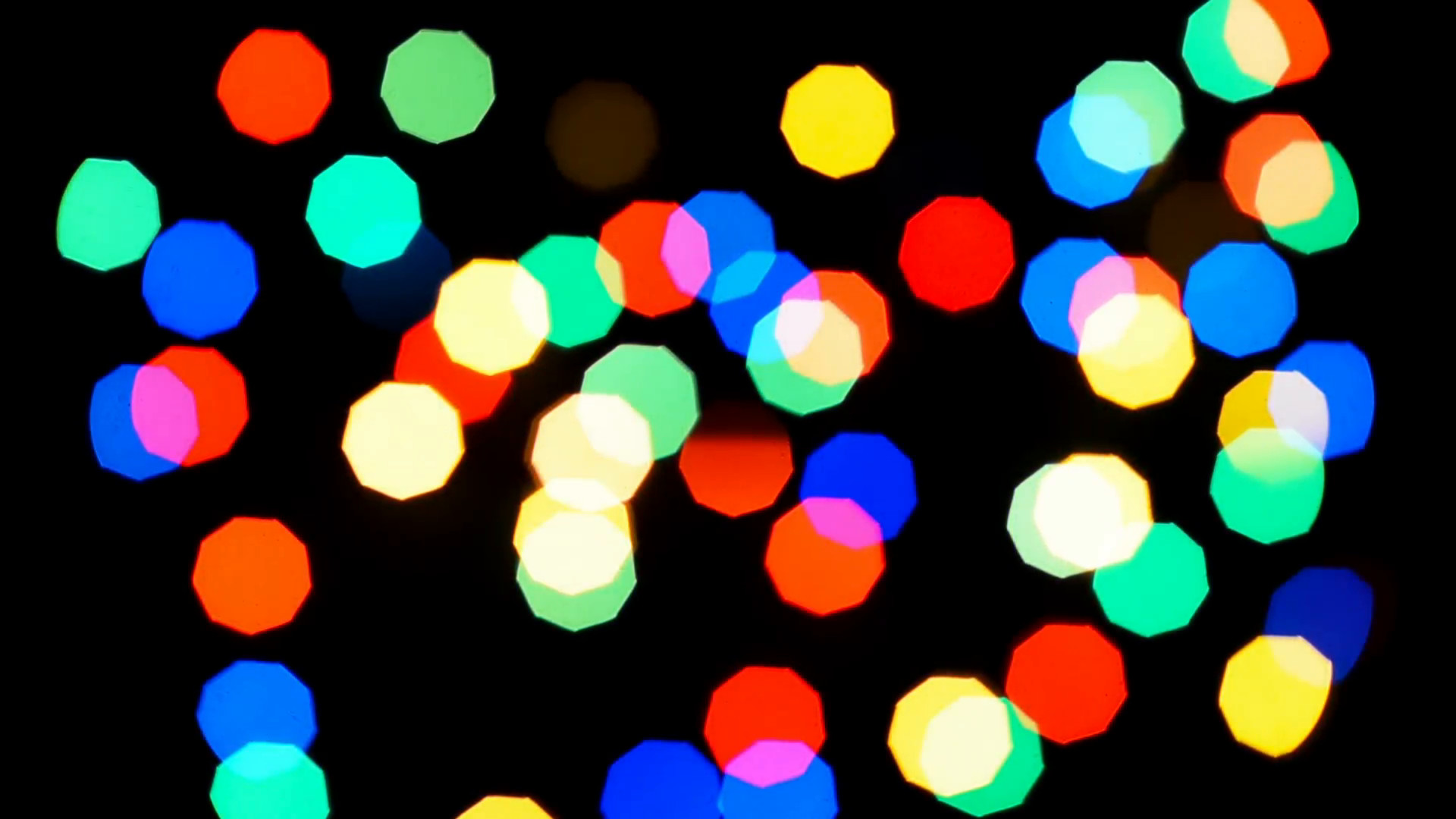 1920x1080 Beautiful colorful defocused bokeh festive lights as abstract holiday  celebration background.  full hd footage