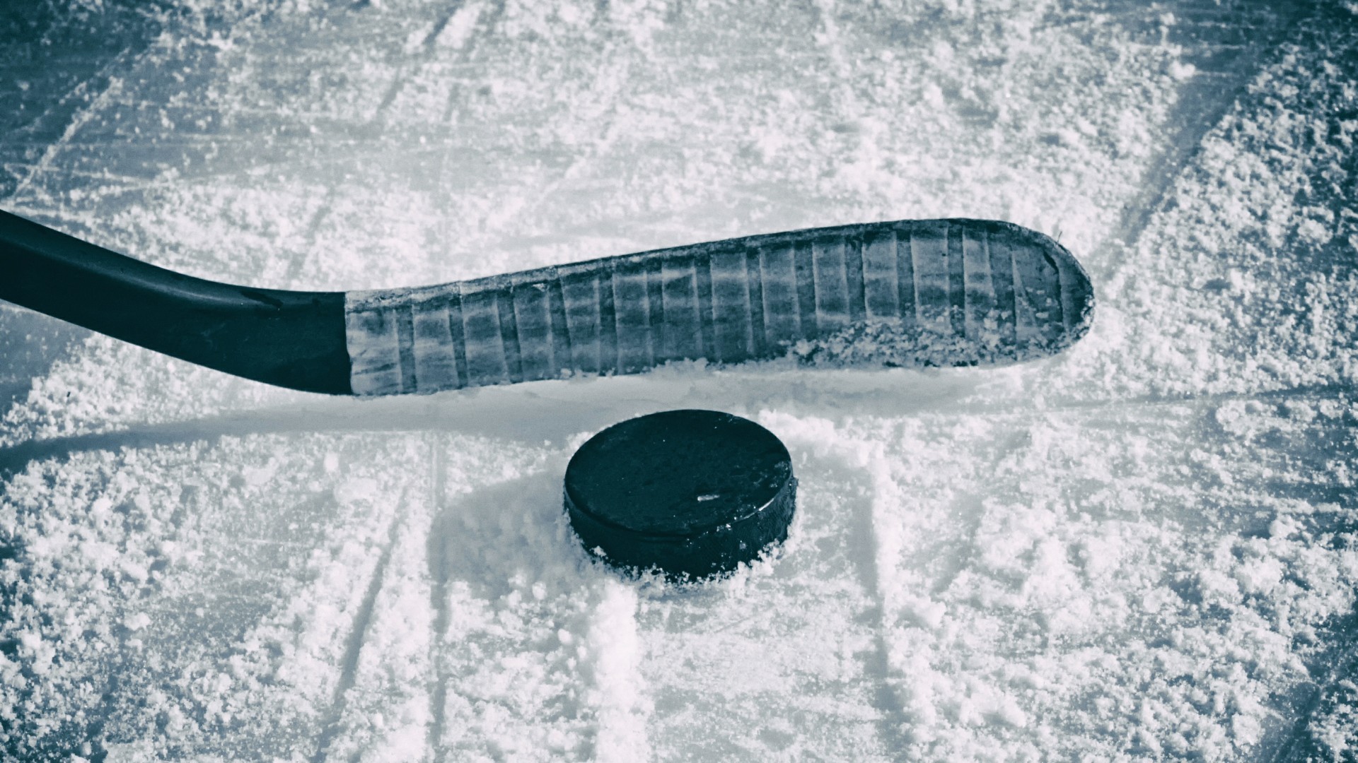 1920x1080 Hockey stick and puck on the ice wallpaper