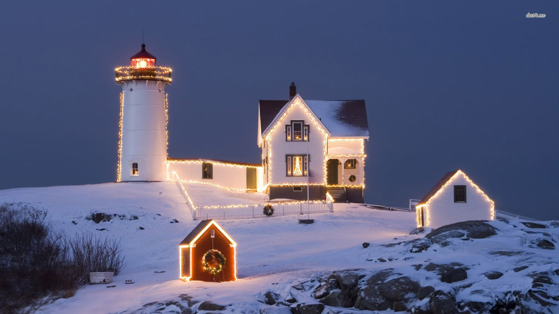 1920x1080 Christmas lights sourrounding the lighthouse wallpaper