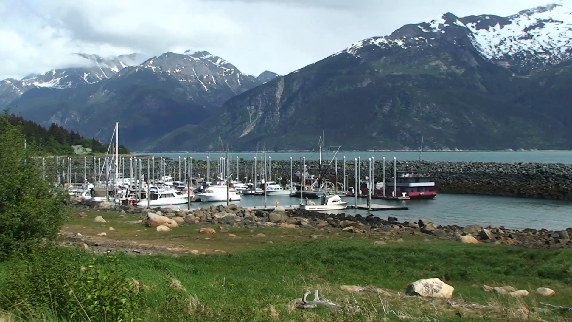 1920x1080 Alaska harbour with mountains in the background Stock Video Footage -  Storyblocks Video
