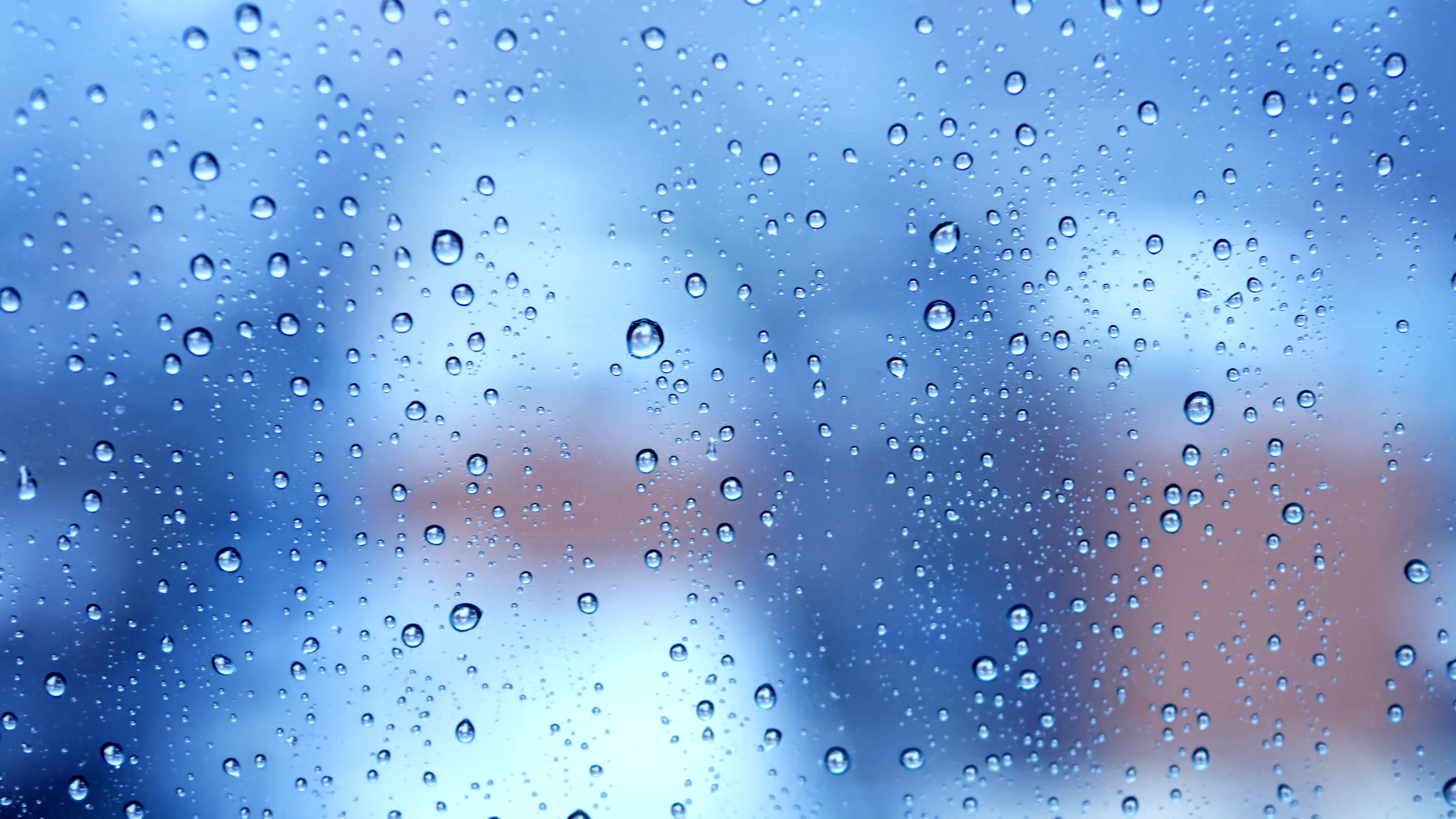 3840x2160 blue light rainy day mood. raining weather background. water drops on  window Stock Video Footage - VideoBlocks