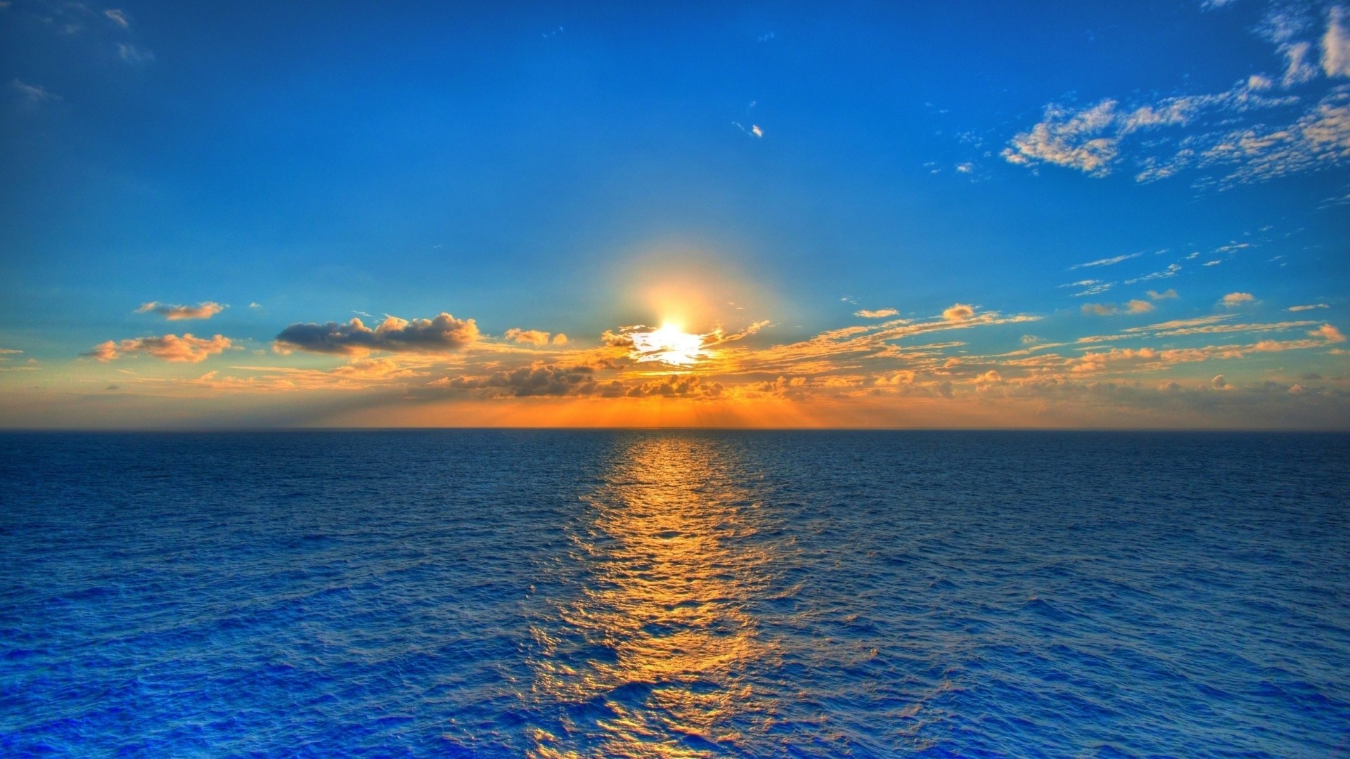 1920x1080 Preview wallpaper sky, sun, sea, path, reflection, clouds, ripples,