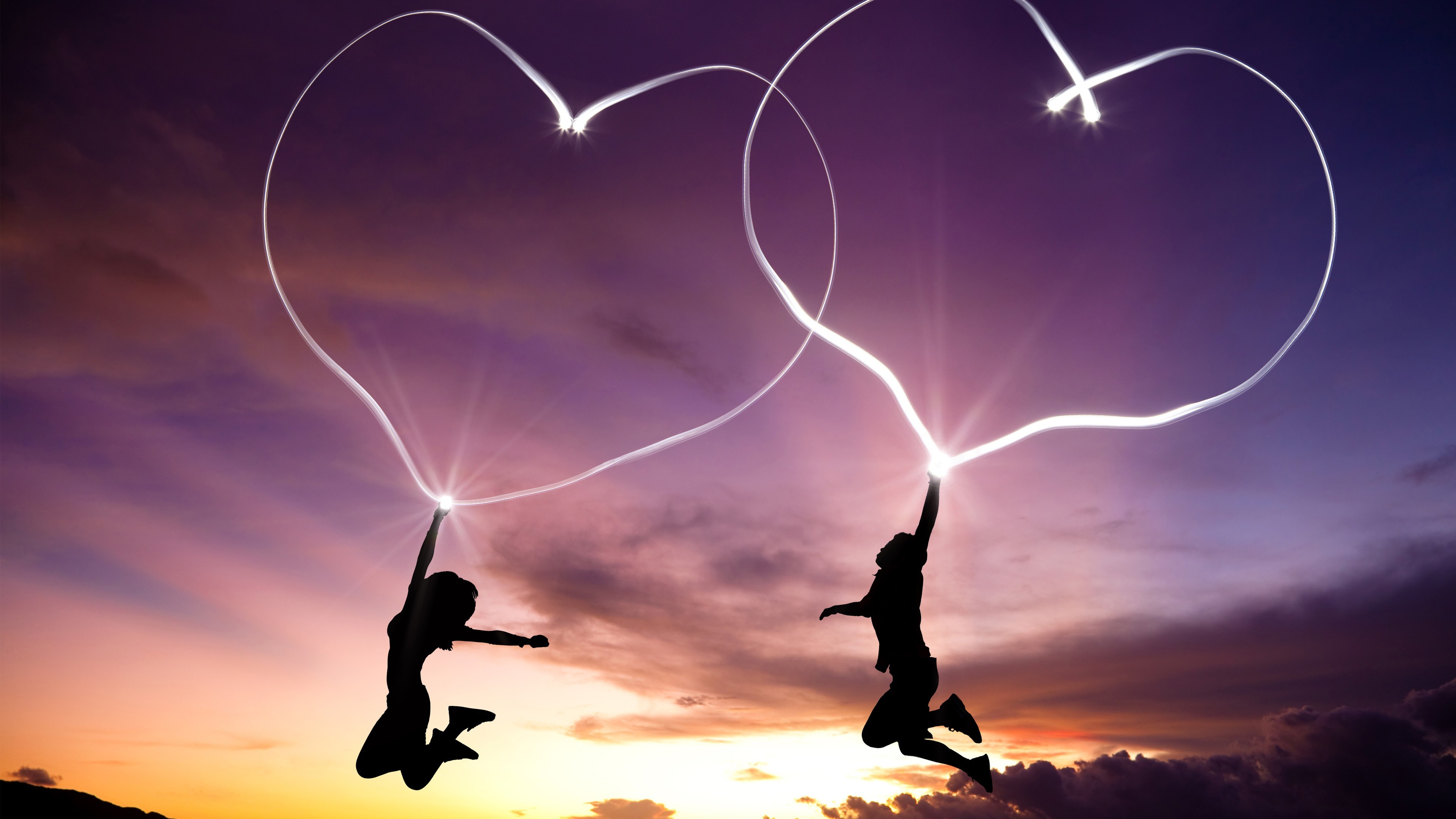 3840x2160 Love wallpapers with two jumping lovers