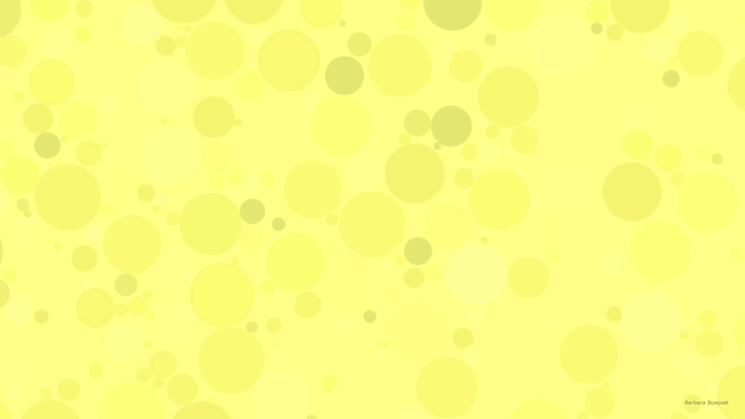 2560x1440 Yellow pattern wallpaper with circles.