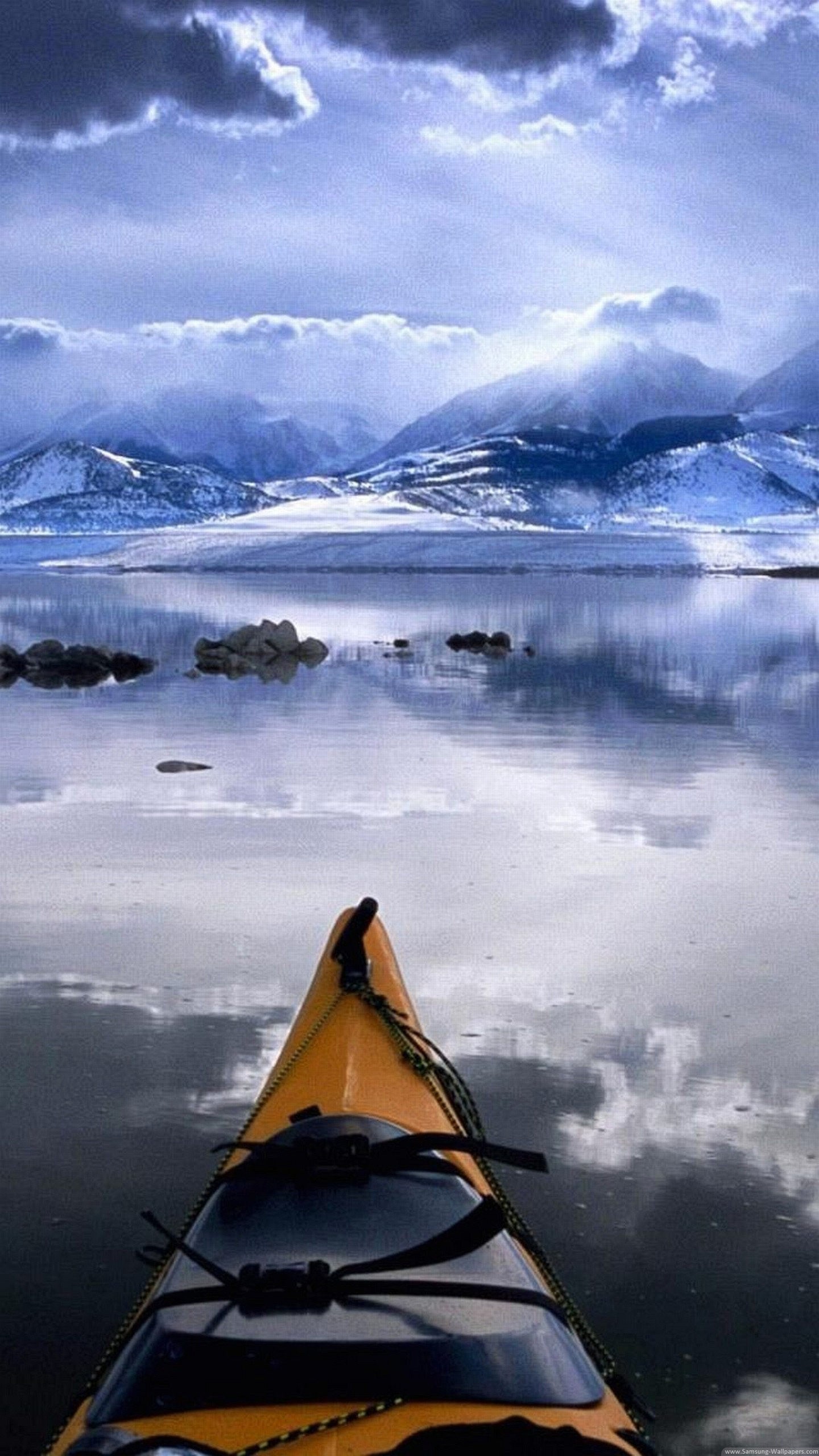 1440x2560 Kayak in a frozen lake
