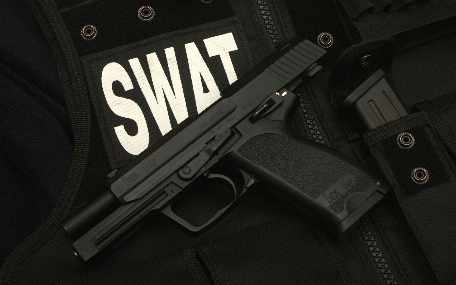1920x1200 Swat pistol on vest HD wallpaper