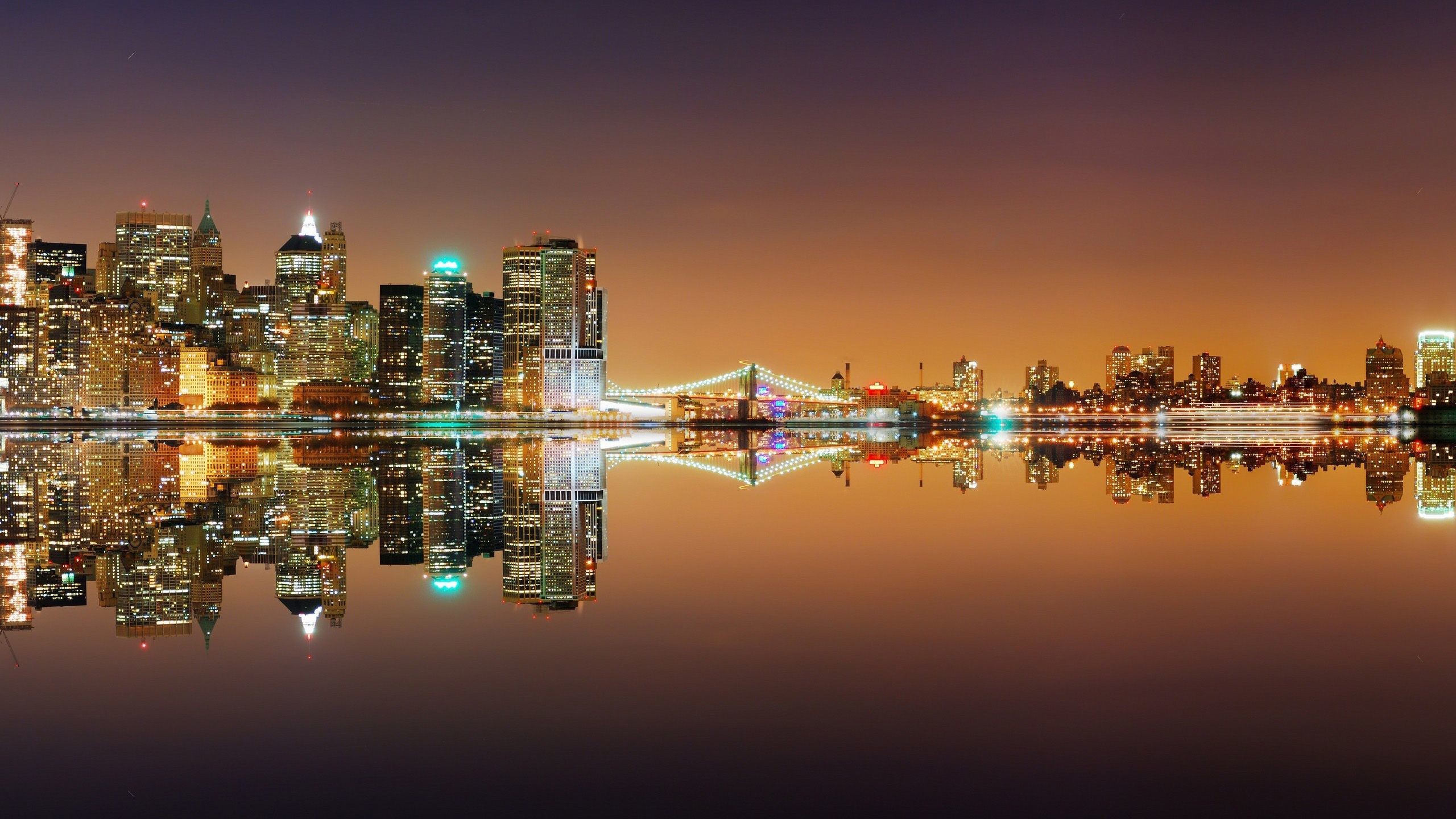 2560x1440 New York Skyline Reflection At Night wallpaper
