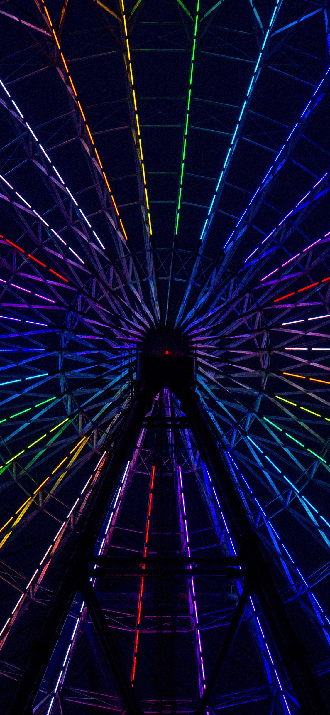 1125x2436 iPhone wallpaper neon wheel colorful Neon lights