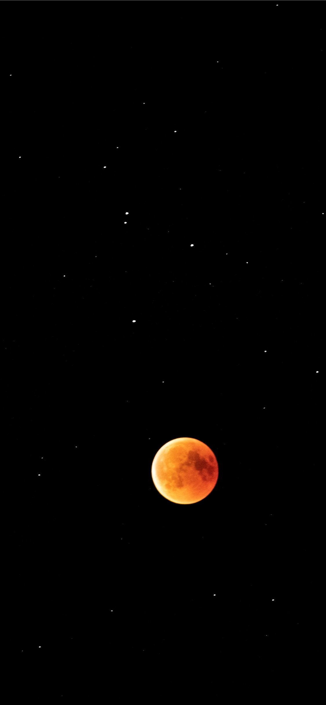 1125x2436 ... Lunar eclipse within the stars iPhone X wallpaper.