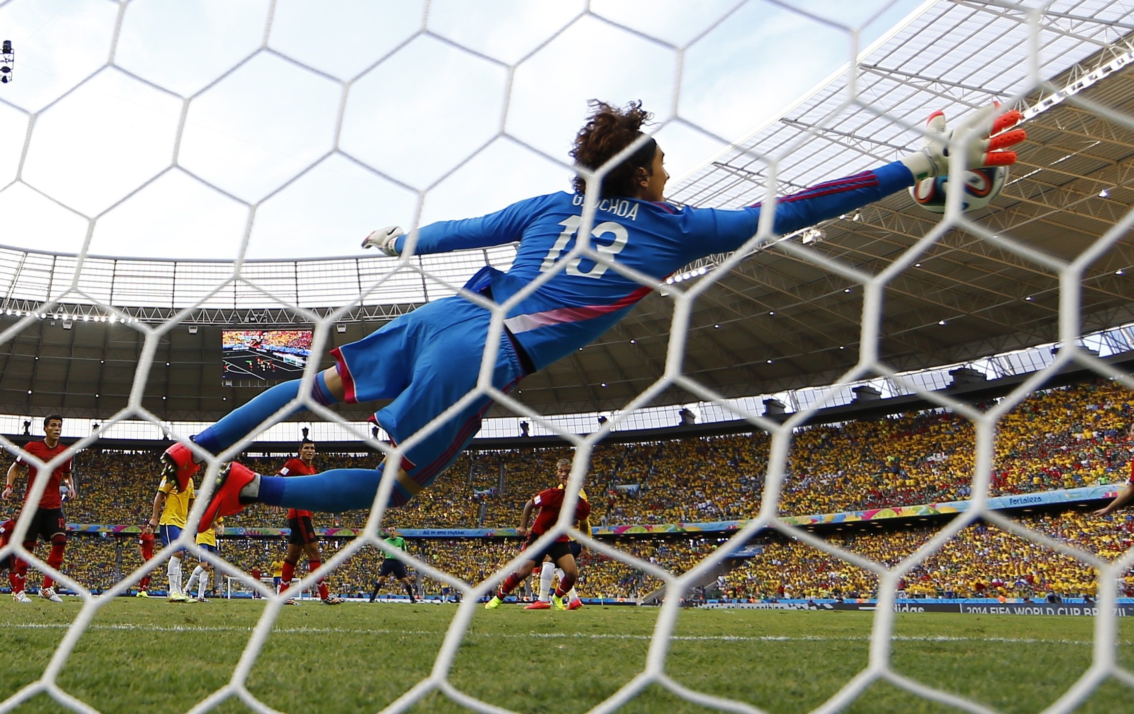 2310x1456 ... Mexico goalkeeper Guillermo Ochoa makes a save on a shot by Brazil's  Neymar during Tuesday's match