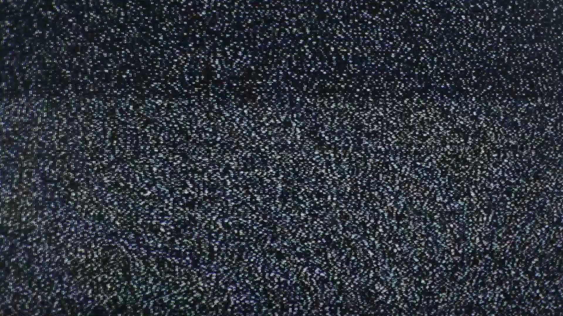 1920x1080 Tv noise pollution grains. Static grainy noise from an old analog tv  screen. Bad signal, weak reception, digital pollution. Real footage.
