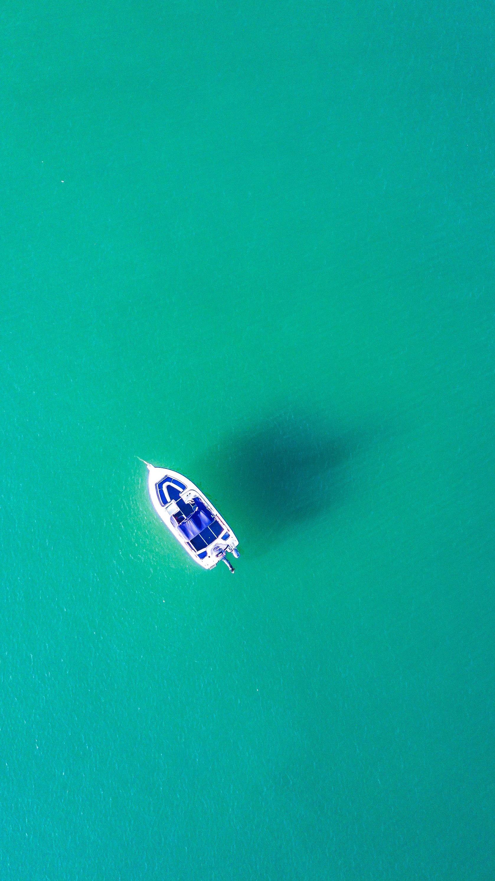 1677x2985 Boat-in-Transparent-Water-Minimal-iPhone-Wallpaper
