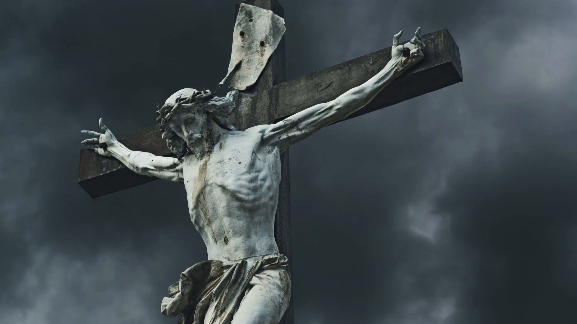 1920x1080 Crucifixion. Christian cross with Jesus Christ statue over stormy clouds  time lapse. , 1080p, hd format Stock Video Footage - VideoBlocks