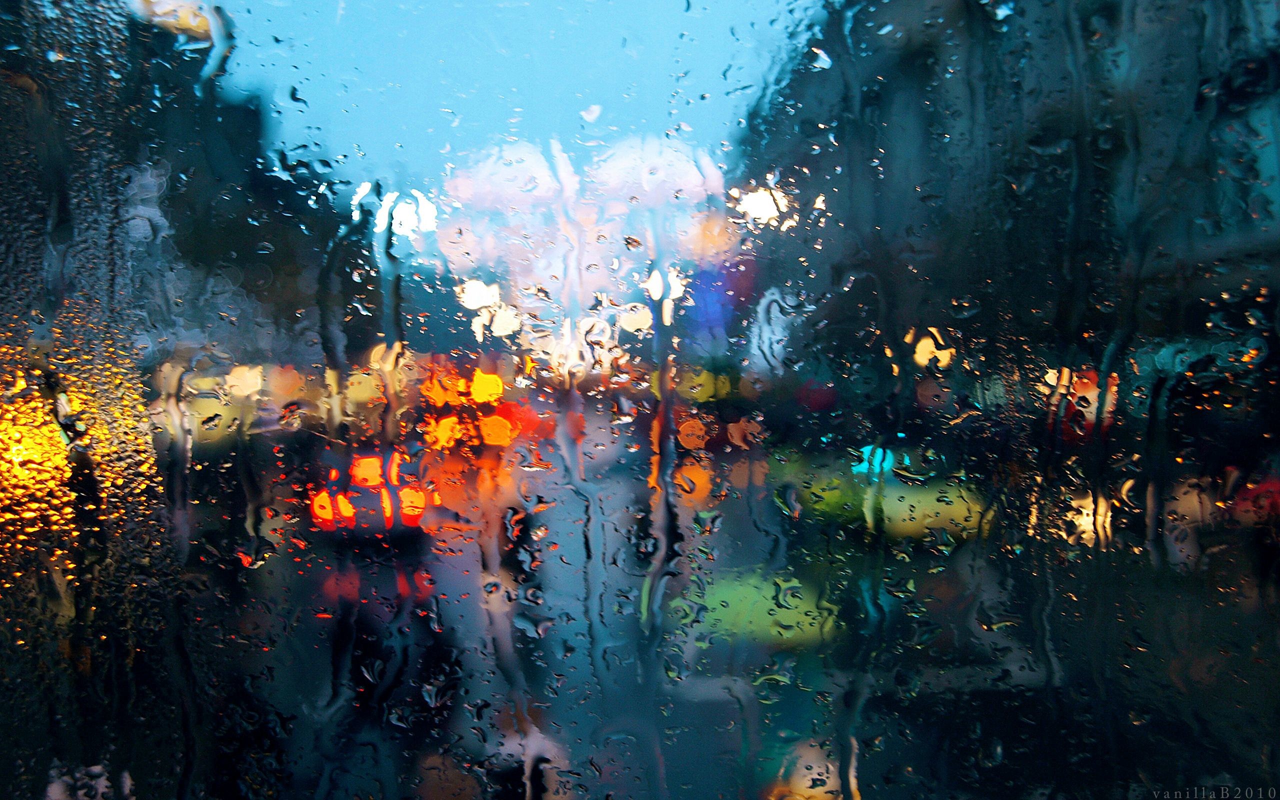 2560x1600 City behind the rainy window HD Wallpaper